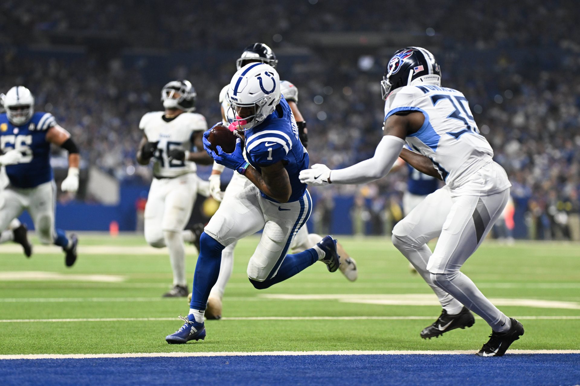 Indianapolis Colts wide receiver Josh Downs (1) makes a catch for a touchdown during the third quarter against the Tennessee Titans at Lucas Oil Stadium.