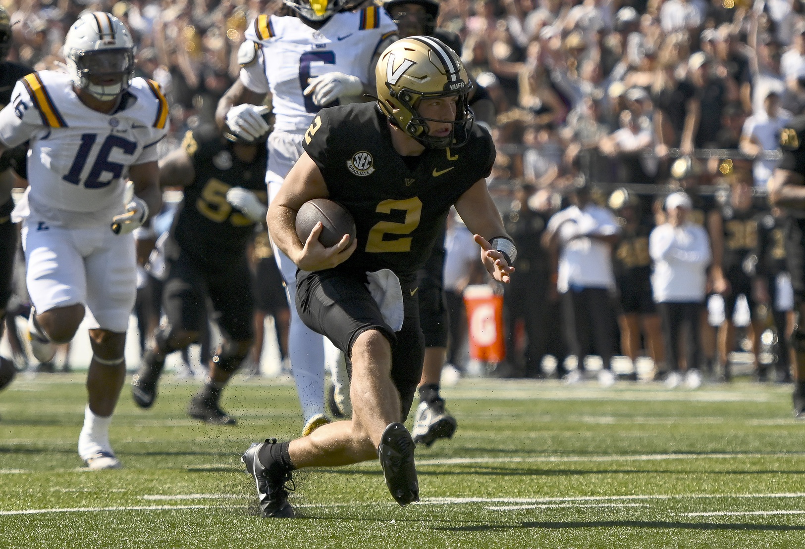 Vanderbilt Commodores quarterback Diego Pavia (2) runs with the ball against the Louisiana State Tigers during the first half at FirstBank Stadium.