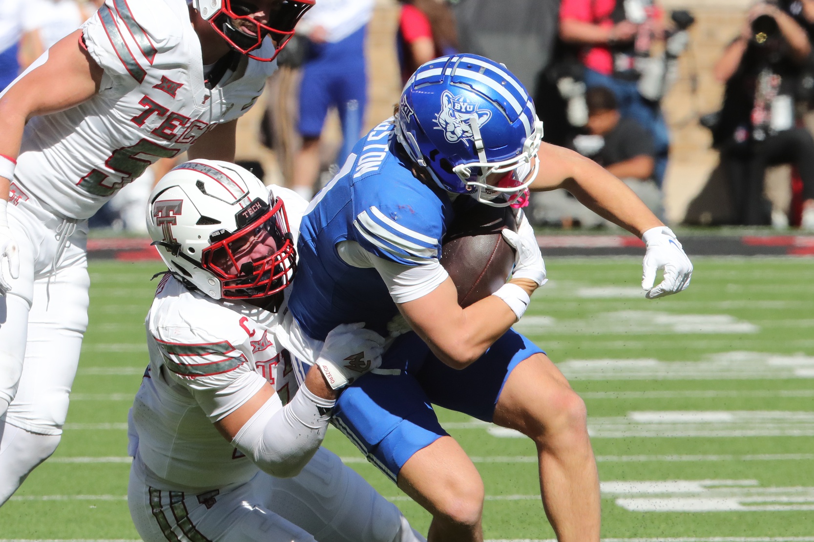 Brigham Young Cougars wide receiver parker Kingston (11) is tackled by Texas Tech Red Raiders defensive back Jacob Rodriguez (10) in the first half at Jones AT&T Stadium.