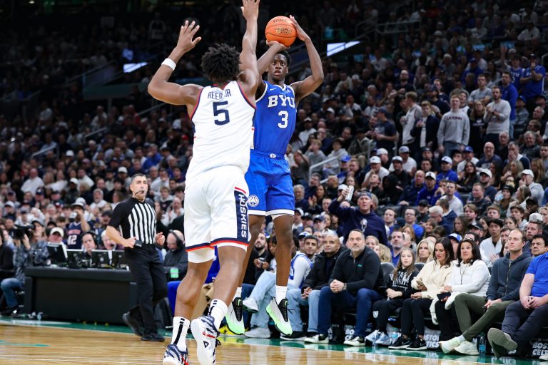 BYU's AJ Dybantsa, of Brockton, shoots a jump shot over the contest of UConn's Tarris Reed Jr. during a game at TD Garden in Boston, Massachusetts on Saturday, Nov. 15, 2025.