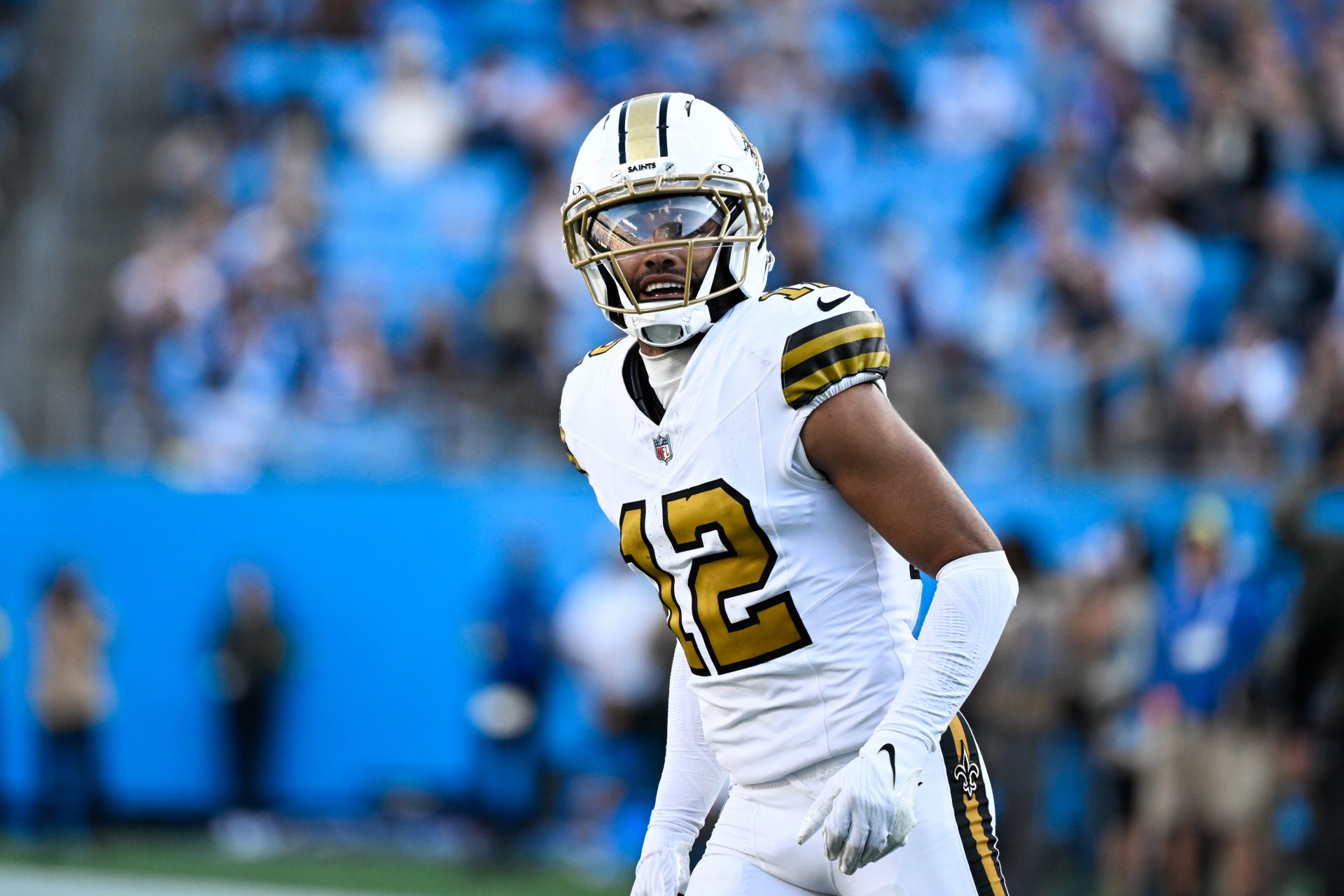 New Orleans Saints wide receiver Chris Olave (12) looks on during the fourth quarter against the Carolina Panthers at Bank of America Stadium.