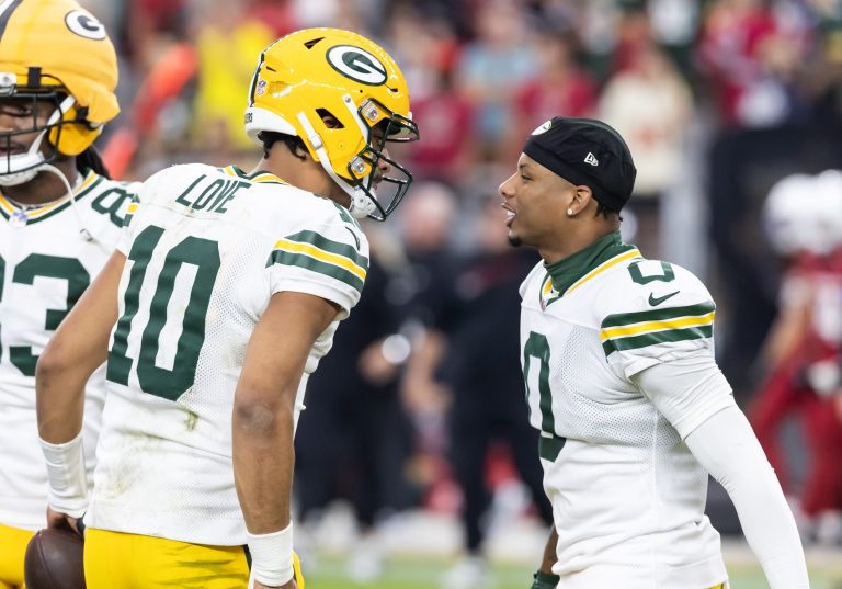 Green Bay Packers quarterback Jordan Love (10) with wide receiver Matthew Golden (0) against the Arizona Cardinals at State Farm Stadium.
