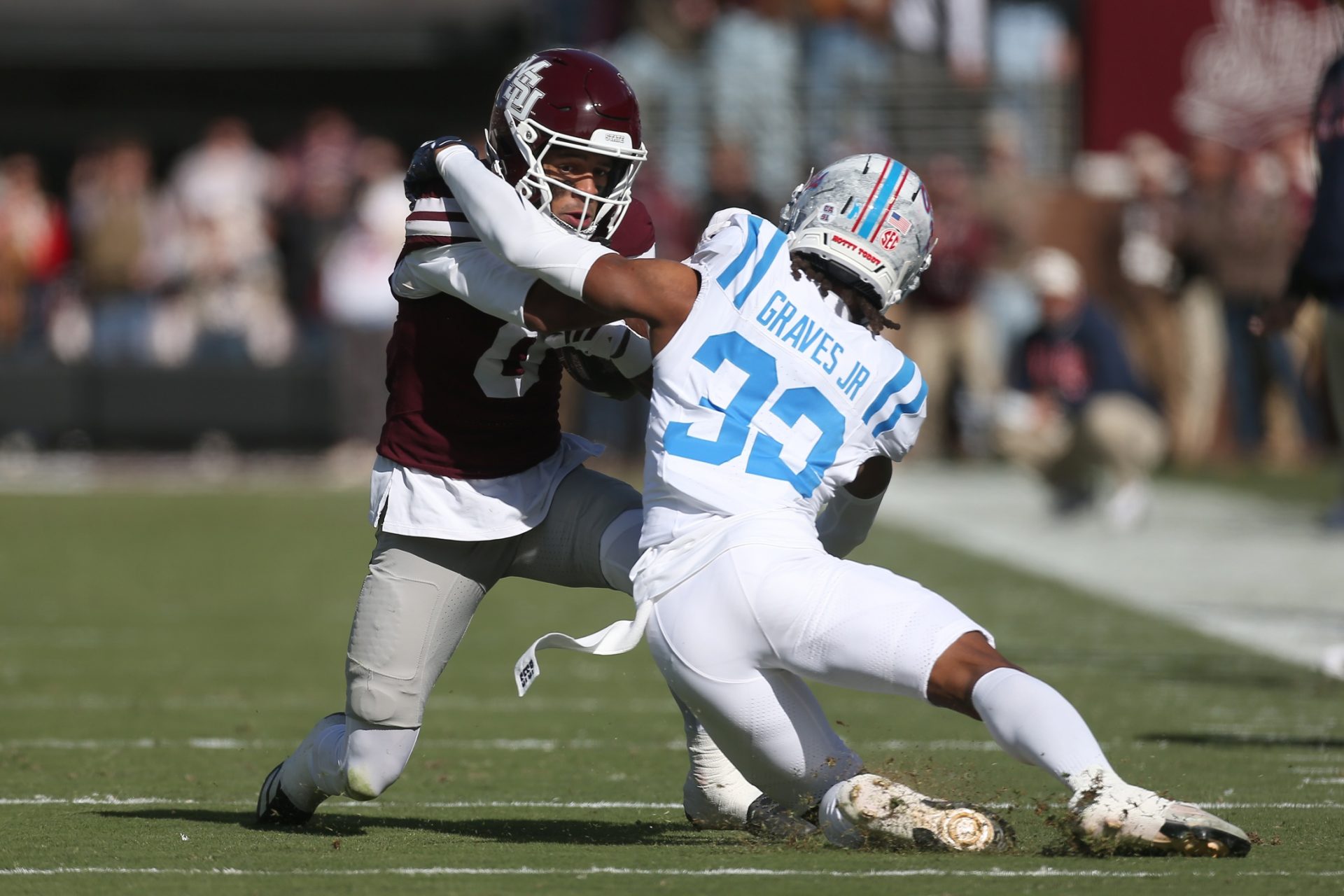 Mississippi State Bulldogs wide receiver Brenen Thompson (0) runs against Mississippi Rebels defensive back Chris Graves Jr. (32) in the first half at Davis Wade Stadium at Scott Field.