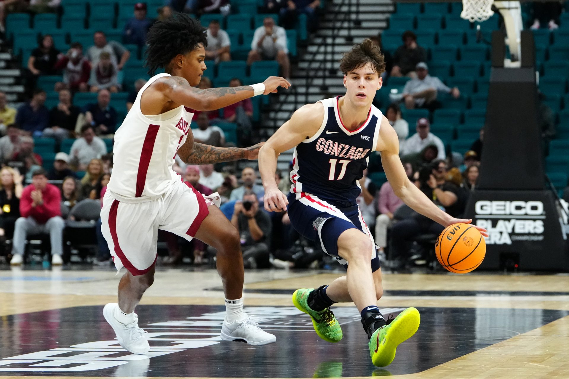 Gonzaga Bulldogs guard Mario Saint-Supery (17) controls the ball against Alabama Crimson Tide guard Aden Holloway (2) during the second half in a 2025 Players Era Festival group play game at MGM Grand Garden Arena.
