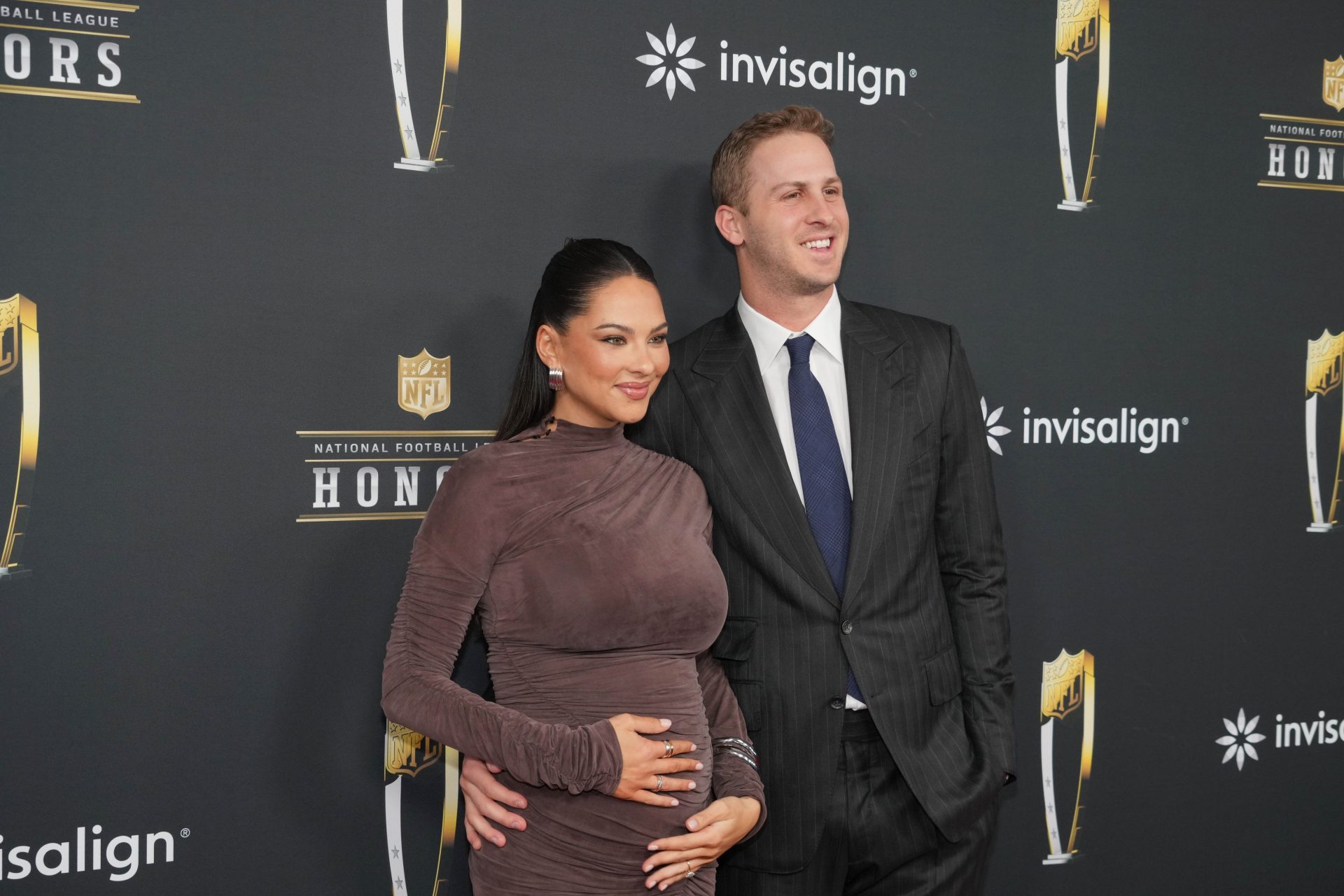 Jared Goff and his wife Christen Harper on the red carpet before Super Bowl LIX NFL Honors at Saenger Theatre.