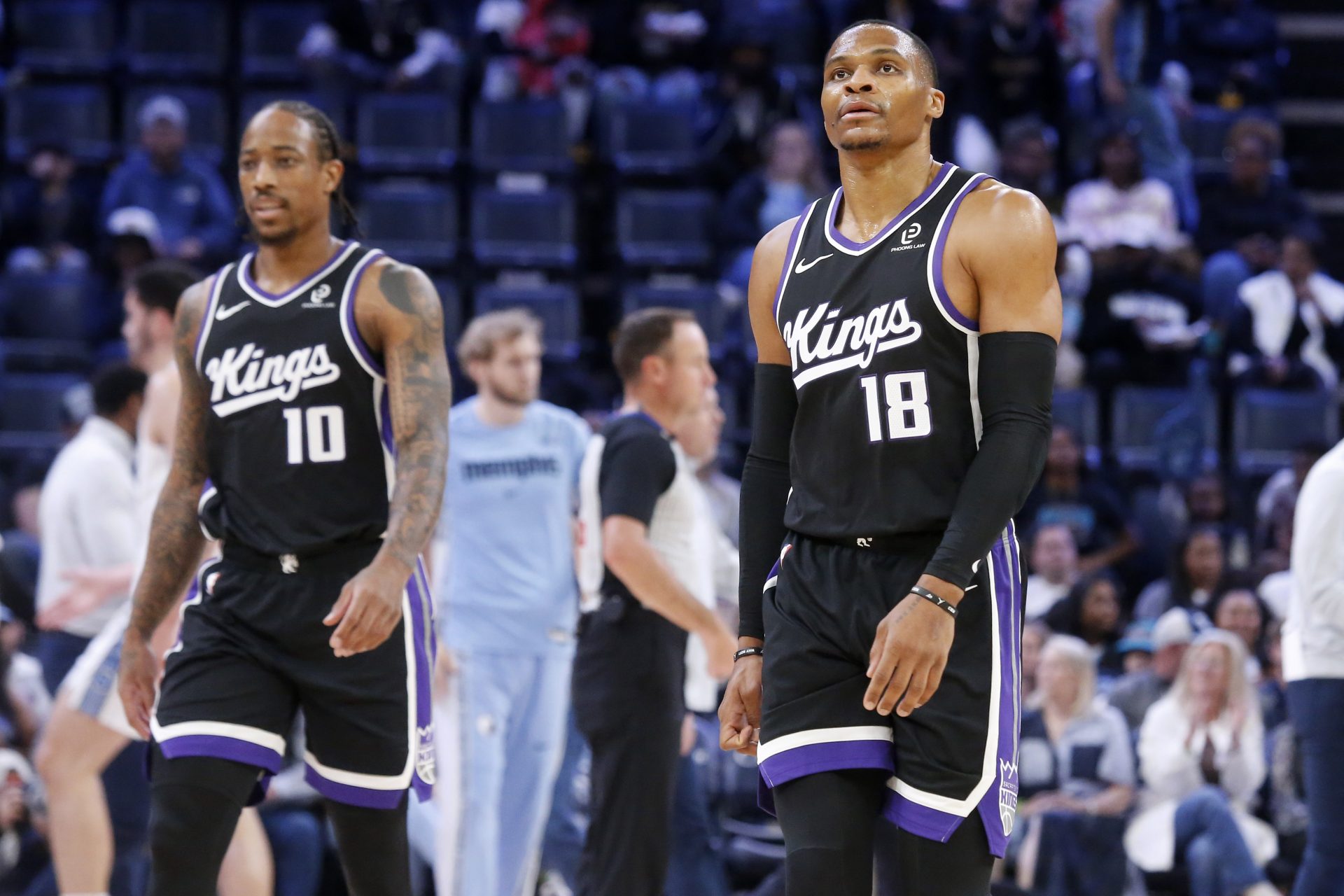 Sacramento Kings guard DeMar DeRozan (10) and guard Russell Westbrook (18) walk toward the bench during a timeout during the first quarter against the Memphis Grizzlies at FedExForum.