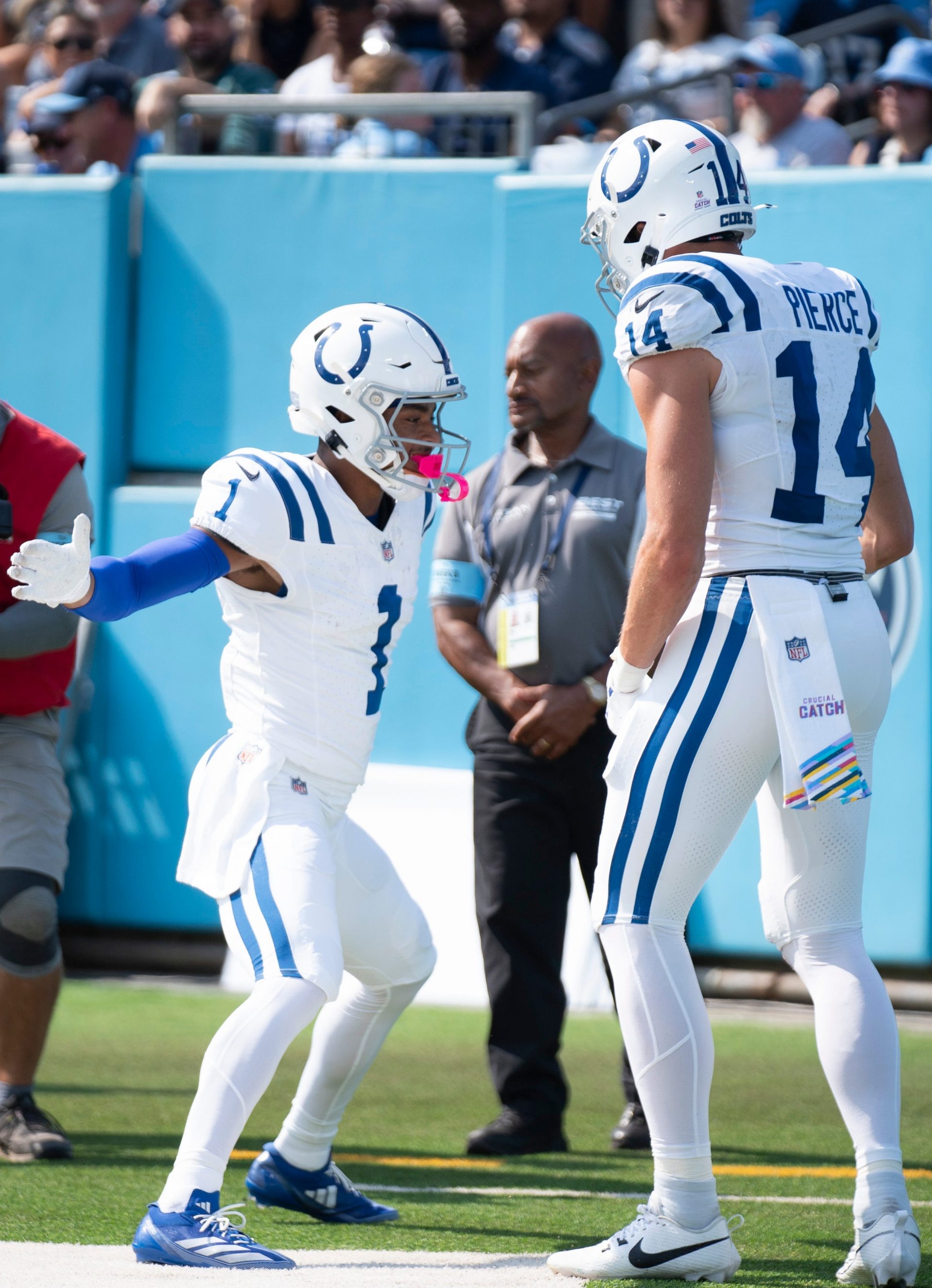 Indianapolis Colts wide receiver Josh Downs (1) and wide receiver Alec Pierce (14) celebrate his touchdown against the Tennessee Titans during the first quarter their game at Nissan Stadium in Nashville, Tenn., Sunday, Oct. 13, 2024.