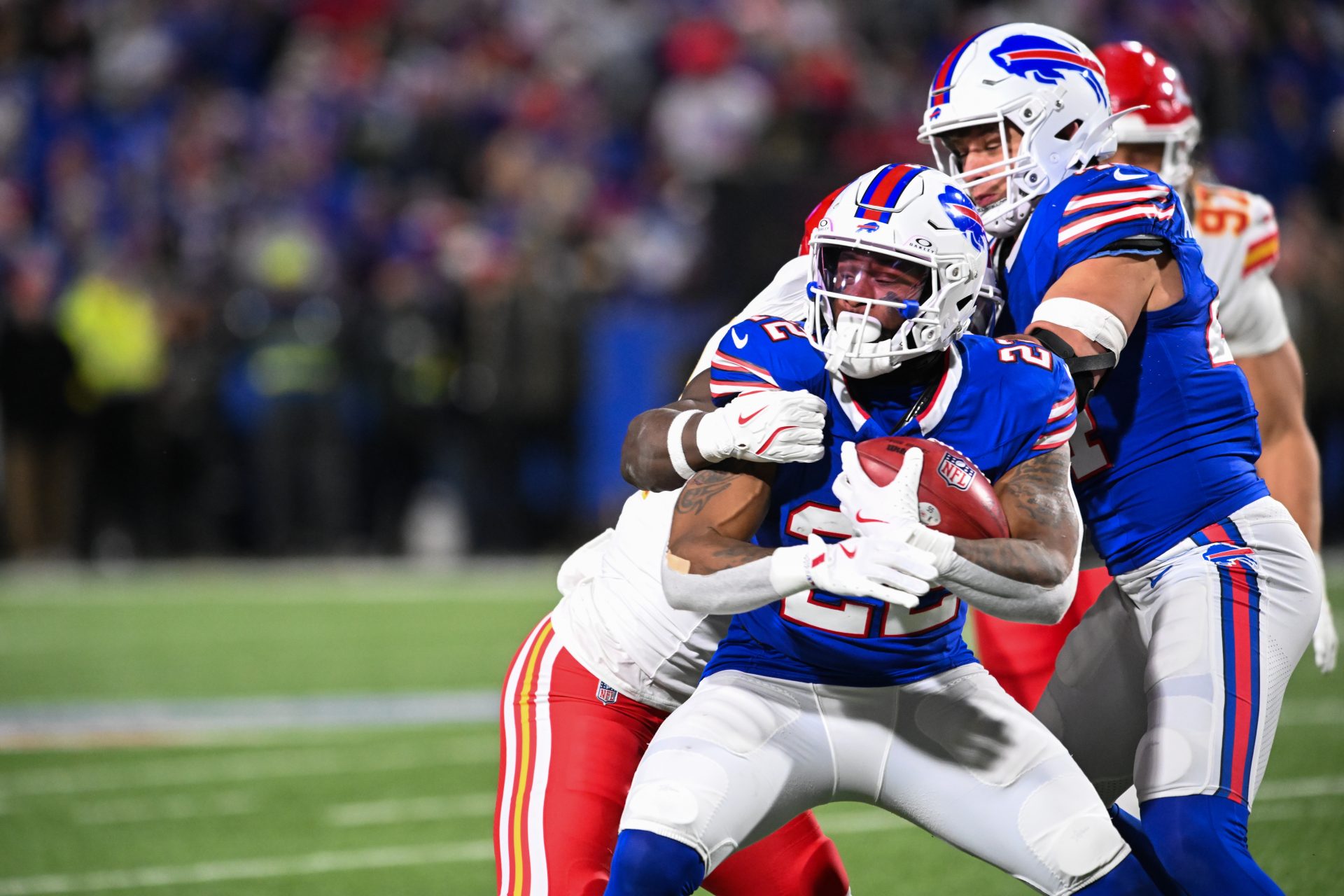 Buffalo Bills running back Ray Davis (22) returns the ball in the second half against the Kansas City Chiefs at Highmark Stadium.