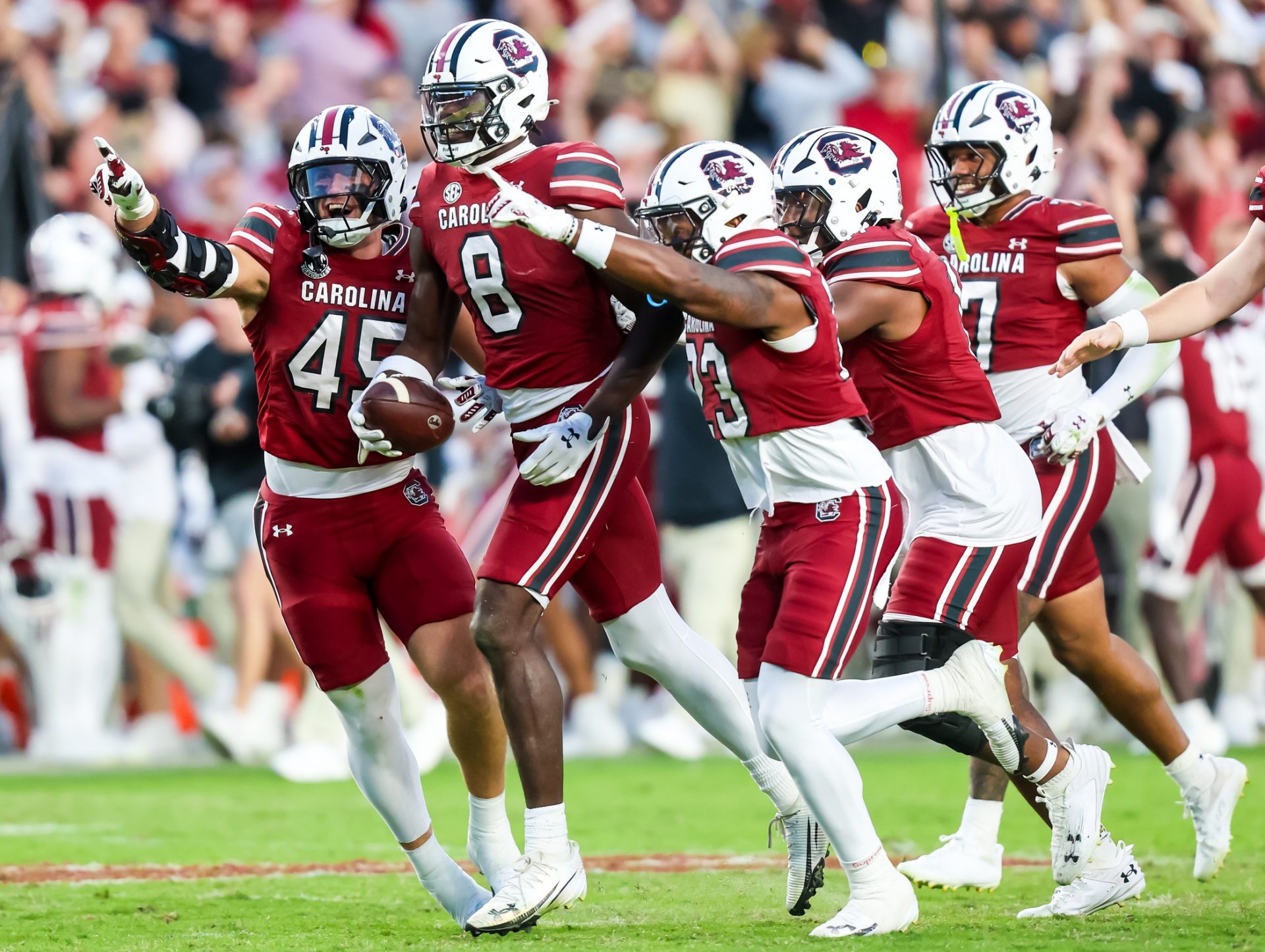 South Carolina Gamecocks wide receiver Nyck Harbor (8) and teammates celebrate a Harbor fumble recovery against the Alabama Crimson Tide on a punt in the fourth quarter at Williams-Brice Stadium.
