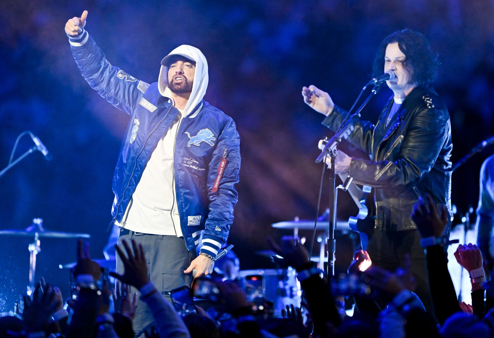 Eminem and Jack White perform during halftime of the game between the Green Bay Packers and Detroit Lions at Ford Field.