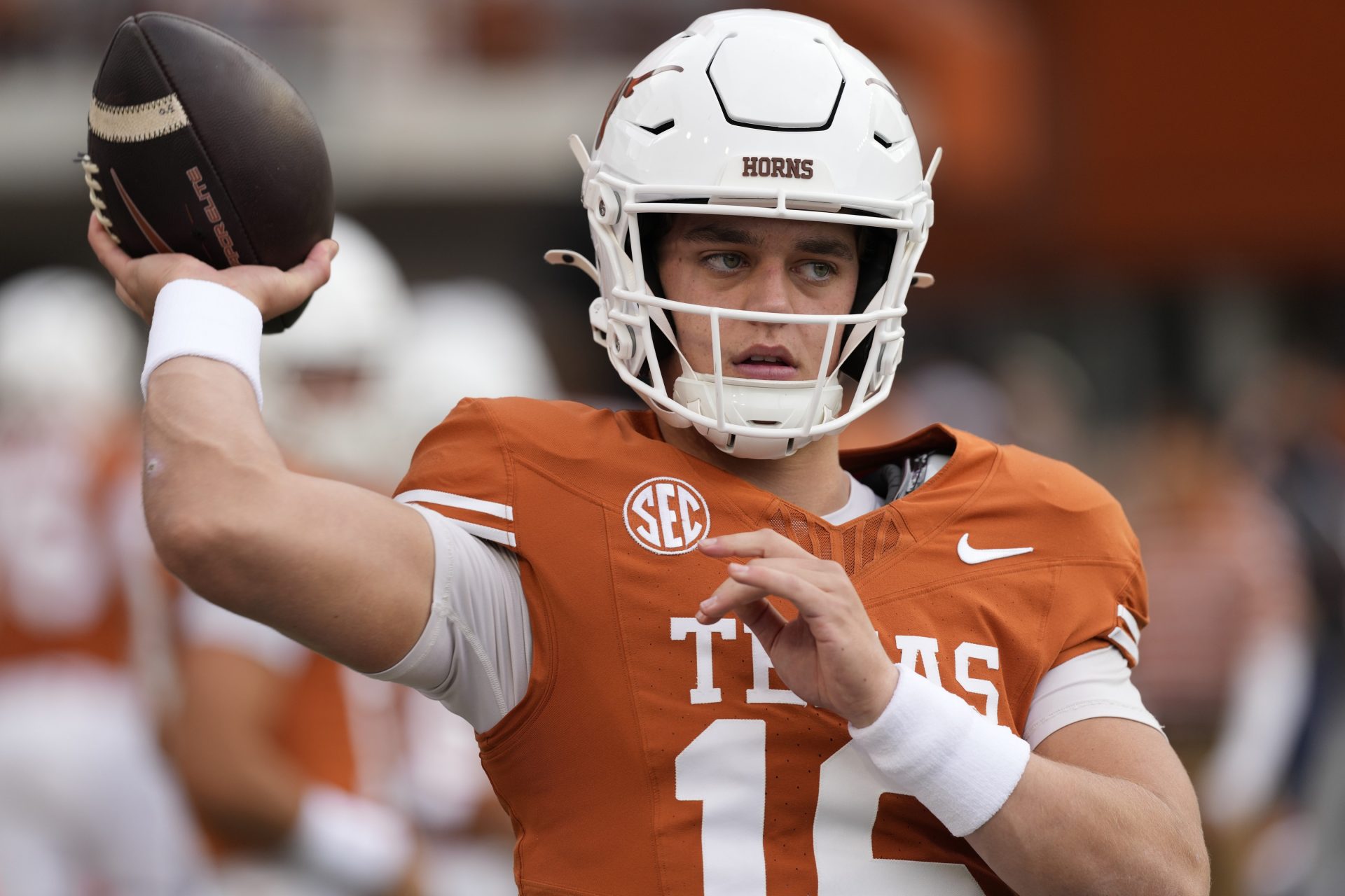 Texas Longhorns quarterback Arch Manning (16) warms up before a game against the Vanderbilt Commodores at Darrell K Royal-Texas Memorial Stadium.
