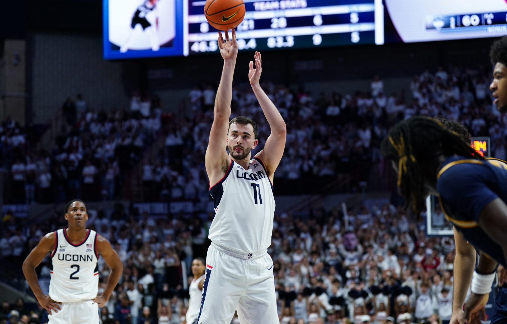 UConn Huskies forward Alex Karaban (11) shoots a free-throw against the New Haven Chargers in the second half at Harry A. Gampel Pavilion.