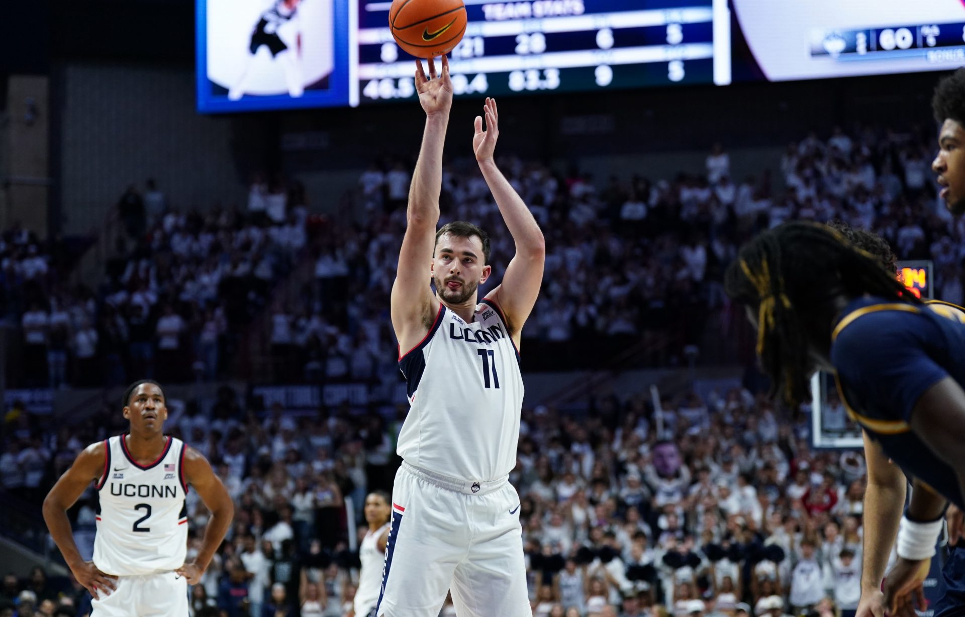 UConn Huskies forward Alex Karaban (11) shoots a free-throw against the New Haven Chargers in the second half at Harry A. Gampel Pavilion.