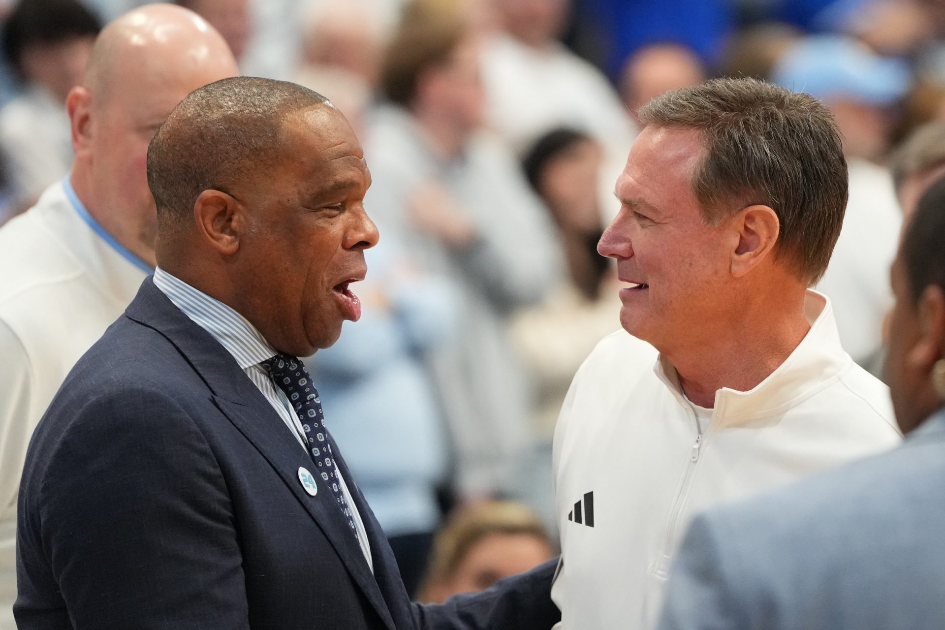 North Carolina Tar Heels head coach Hubert Davis with Kansas Jayhawks head coach Bill Self before the game at Dean E. Smith Center.