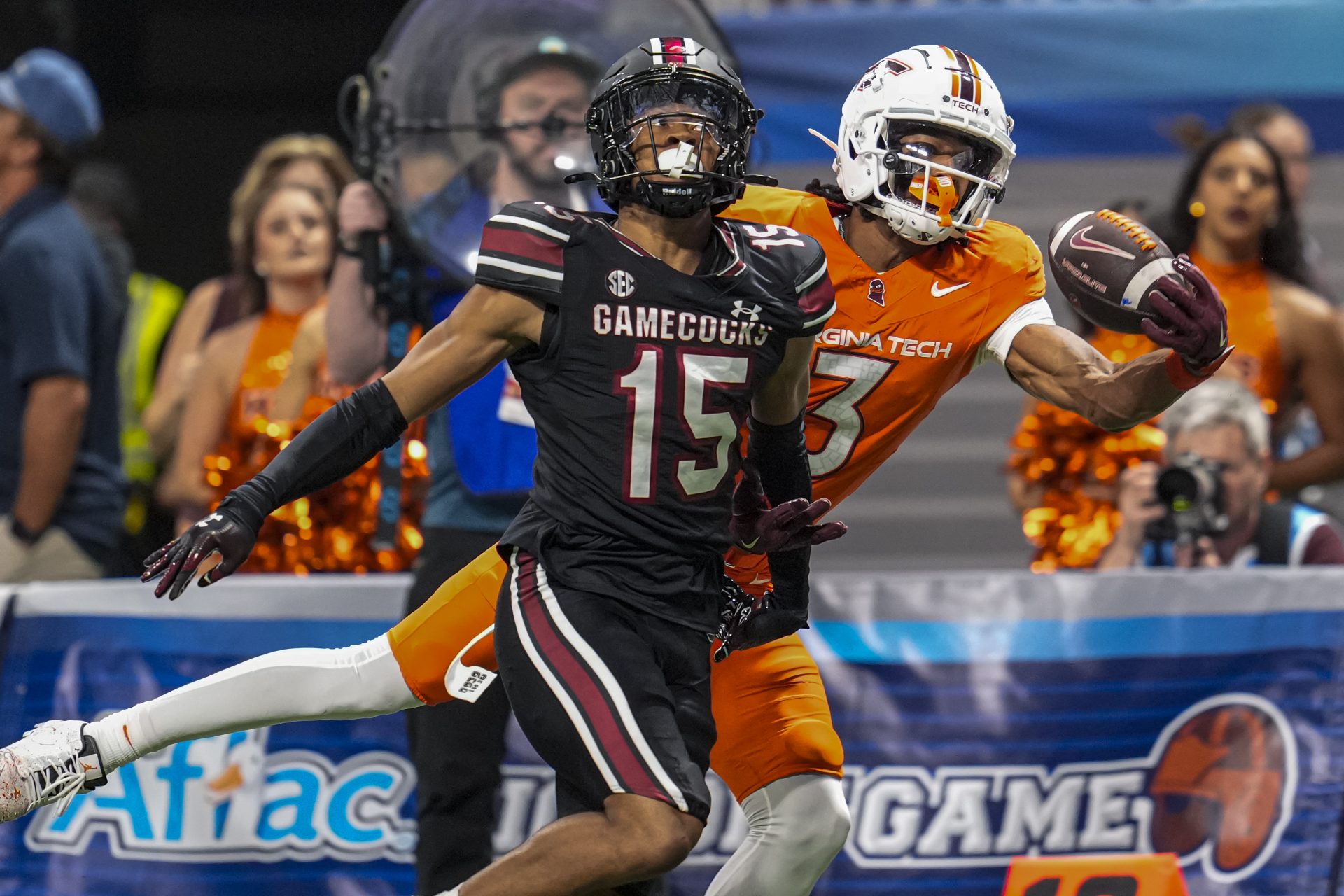 Virginia Tech Hokies wide receiver Donavon Greene (3) tries to make a one handed catch behind South Carolina Gamecocks defensive back Brandon Cisse (15) during the second half at Mercedes-Benz Stadium.