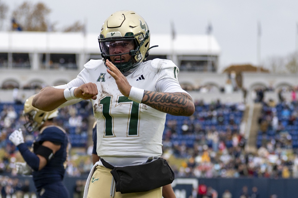 South Florida Bulls quarterback Byrum Brown (17) reacts after scoring a touchdown against the Navy Midshipmen  during the second half at Navy-Marine Corps Memorial Stadium. Navy Midshipmen defeated South Florida Bulls 41-28.