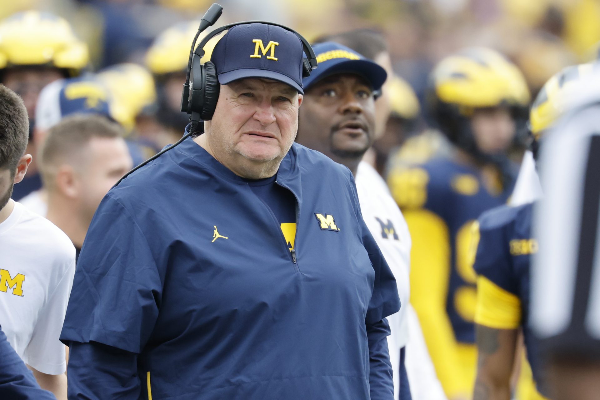 Michigan Wolverines assistant head coach Biff Poggi on the sideline in the first half against the Central Michigan Chippewas at Michigan Stadium.