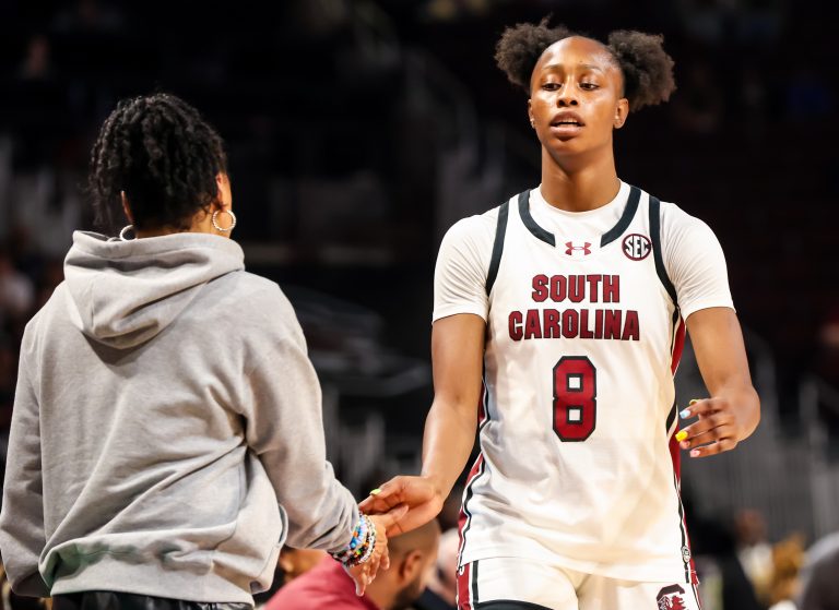 South Carolina Gamecocks head coach Dawn Staley gives forward Joyce Edwards (8) a high five against the Queens Royals in the second half at Colonial Life Arena.