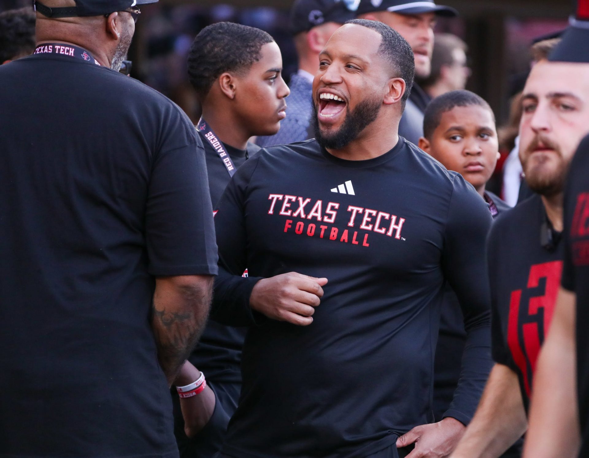 Texas Tech general manager James Blanchard talks to attendees during a Big 12 Conference football game, Saturday, Oct. 11, 2025, at Jones AT&T Stadium in Lubbock.
