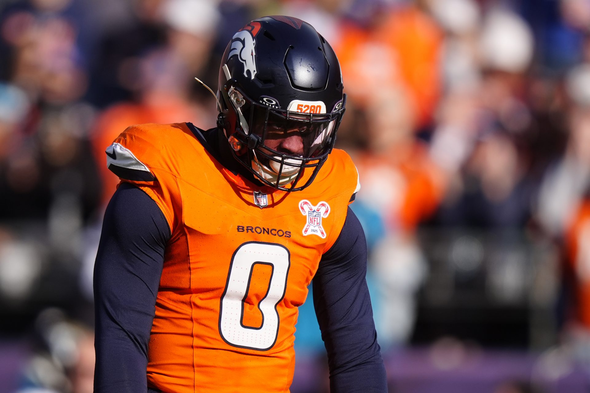 Denver Broncos linebacker Jonathon Cooper (0) before the game at Empower Field at Mile High.