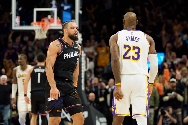 Phoenix Suns forward Dillon Brooks (3) and Los Angeles Lakers forward LeBron James (23) react during an altercation that resulted in a technical for Brooks during the second half of a game at at Mortgage Matchup Center.
