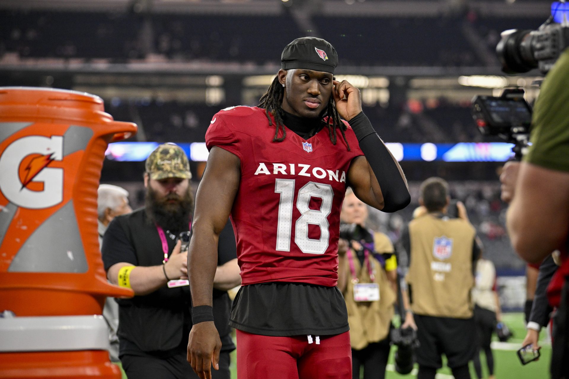 Arizona Cardinals wide receiver Marvin Harrison Jr. (18) walks off the field after the game between the Dallas Cowboys and the Arizona Cardinals at AT&T Stadium.