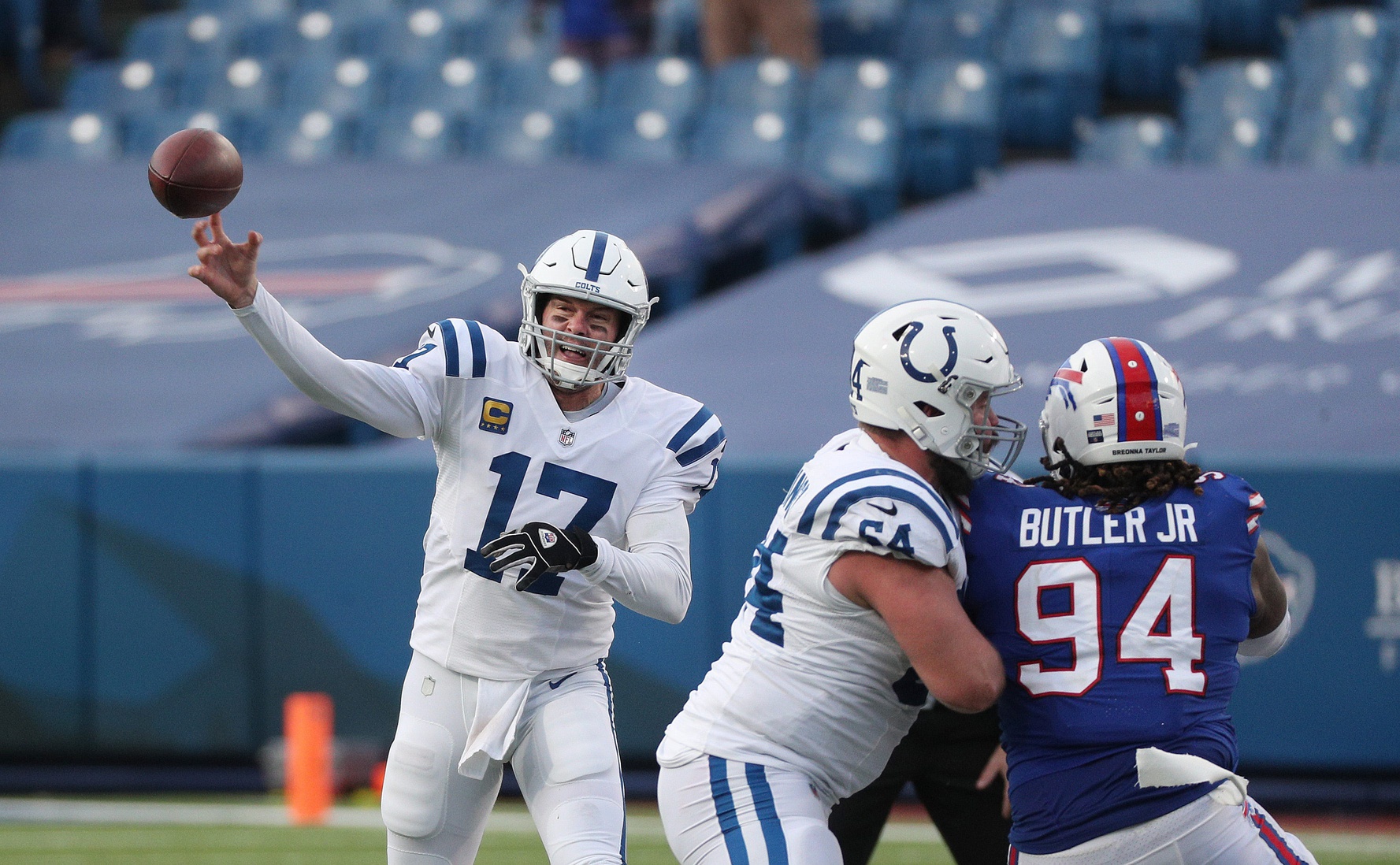 Colts quarterback Philip Rivers steps into a throw over the middle of the field.