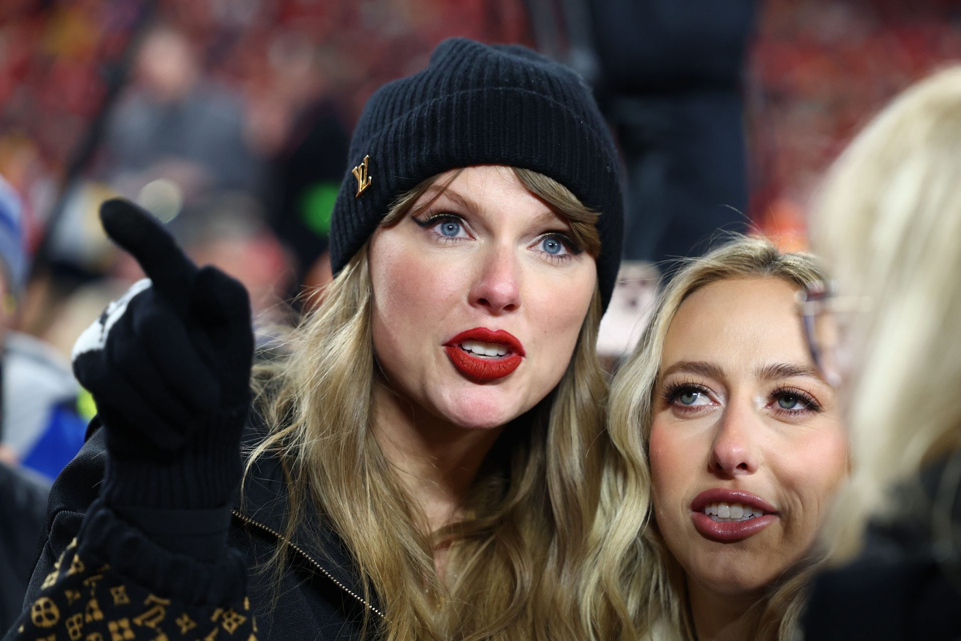 Recording artist Taylor Swift  and Brittany Mahomes react after the AFC Championship game against the Buffalo Bills at GEHA Field at Arrowhead Stadium.