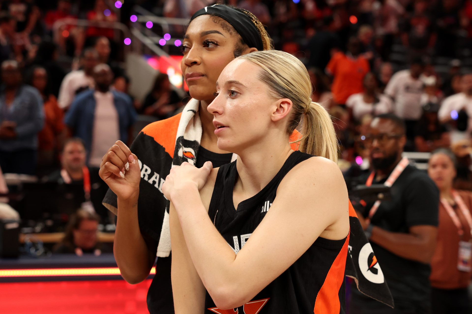 Team Collier guard Paige Bueckers (5) and Team Collier forward Angel Reese (5) celebrate after defeating Team Clark in the 2025 WNBA All Star Game at Gainbridge Fieldhouse.