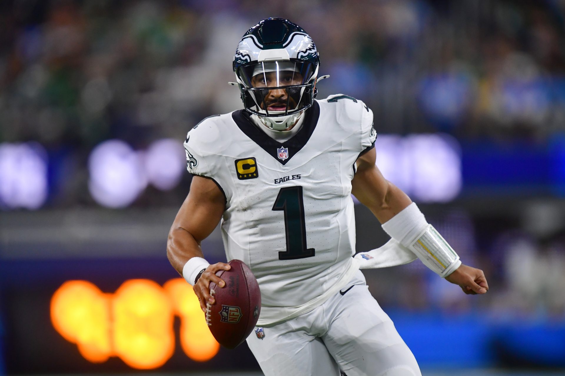 Philadelphia Eagles quarterback Jalen Hurts (1) looks to pass against the Los Angeles Chargers in the first half at SoFi Stadium.