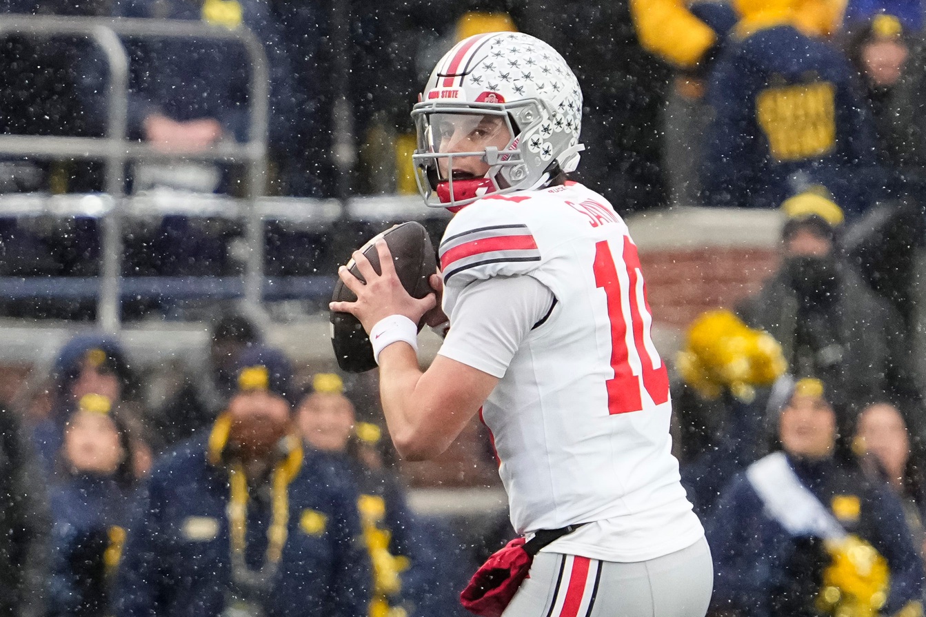 Ohio State Buckeyes quarterback Julian Sayin (10) looks to pass during the NCAA football game against the Michigan Wolverines at Michigan Stadium in Ann Arbor, Mich. on Nov. 29, 2025. Ohio State won 27-9.