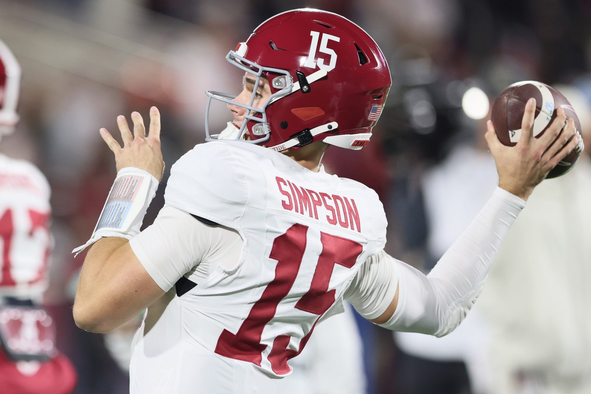 Alabama Crimson Tide quarterback Ty Simpson (15) warms up prior to the CFP 1st Round Game against the Oklahoma Sooners at Gaylord Family OK Memorial Stadium.