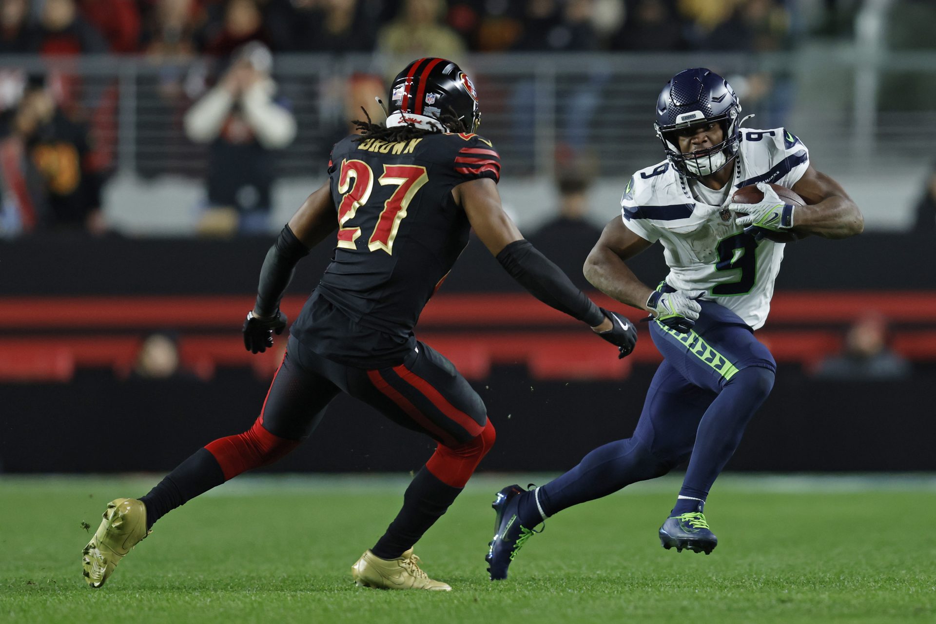 Seattle Seahawks running back Kenneth Walker III (9) rushes the ball against San Francisco 49ers safety Ji'ayir Brown (27) during the second half at Levi's Stadium.