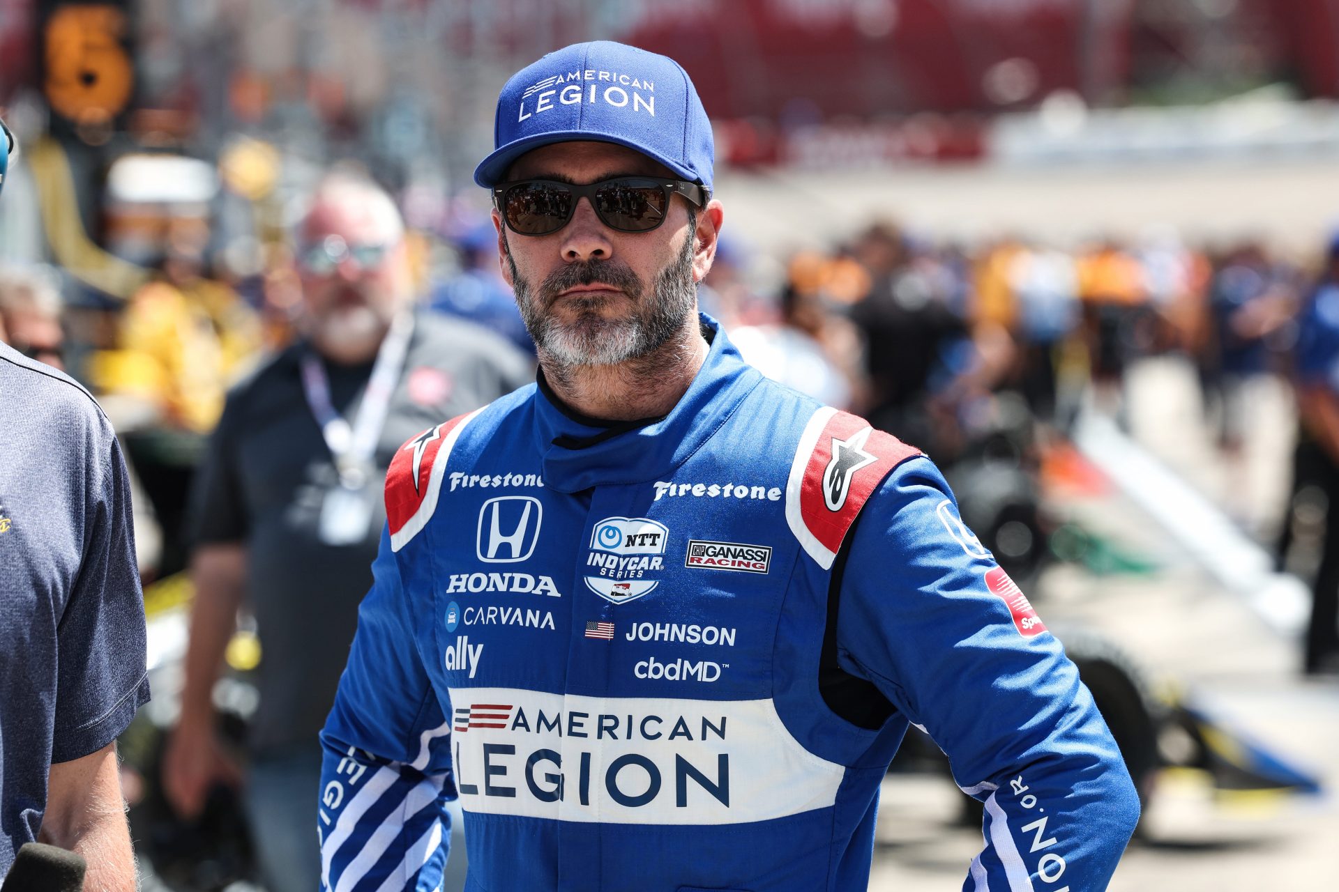Jimmie Johnson looks on before the IndyCar Hy-Vee Salute To Farmers 300 at the Iowa Speedway in Newton, Iowa, on Sunday, July 24, 2022.