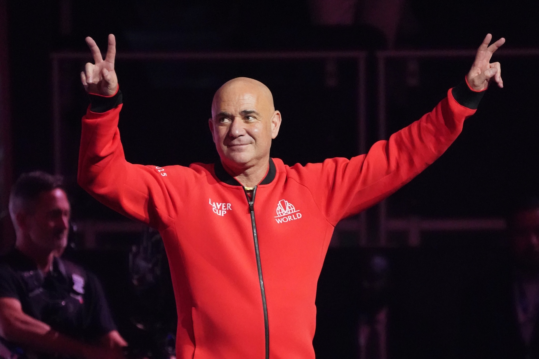 Team World captain Andre Agassi waves to the crowd during introductions at the Laver Cup at Chase Center.