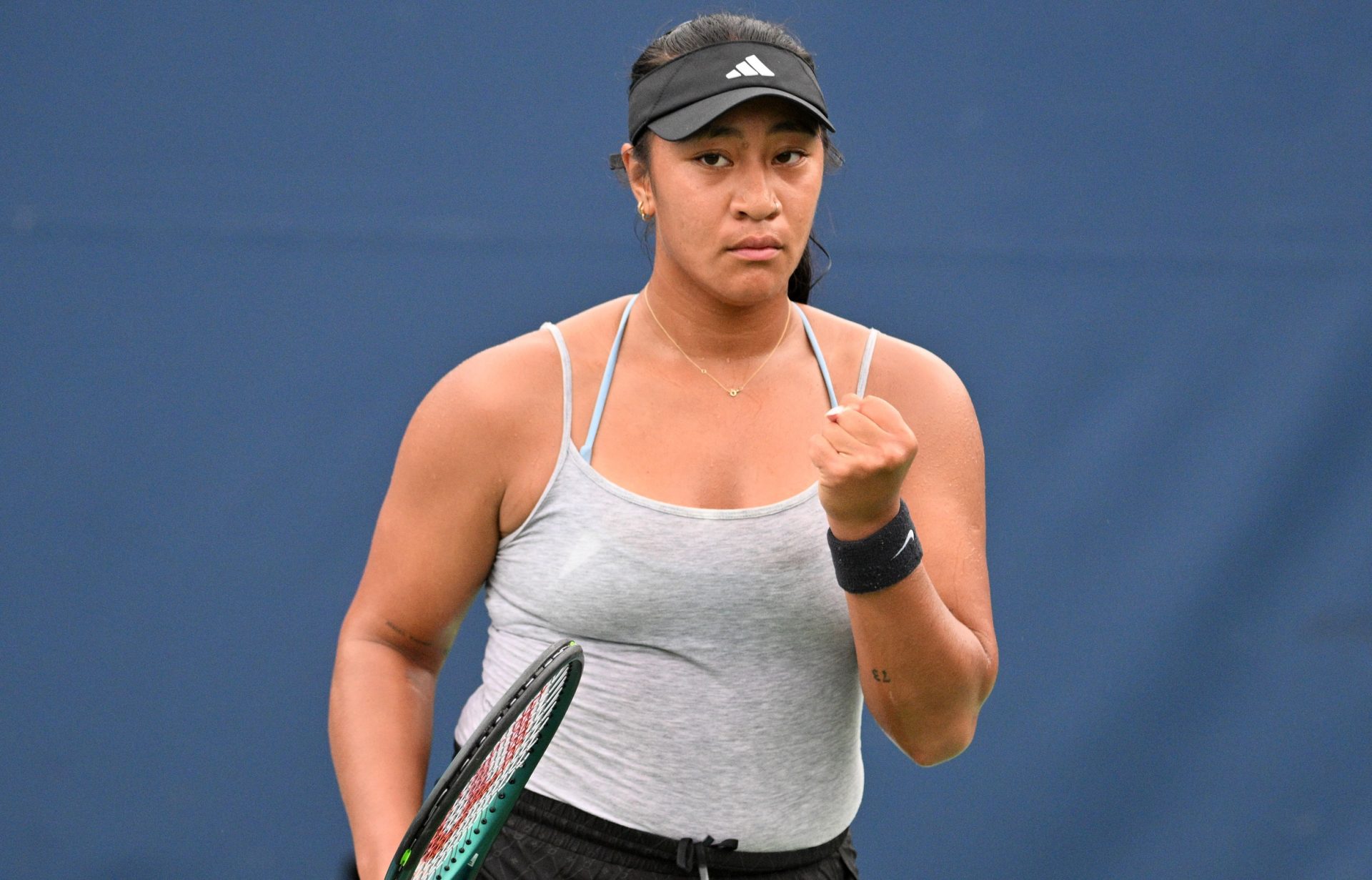 Destanee Aiava (AUS) reacts after winning a set against Greet Minnen (BEL, not shown) in second round qualifying play at Sobeys Stadium.