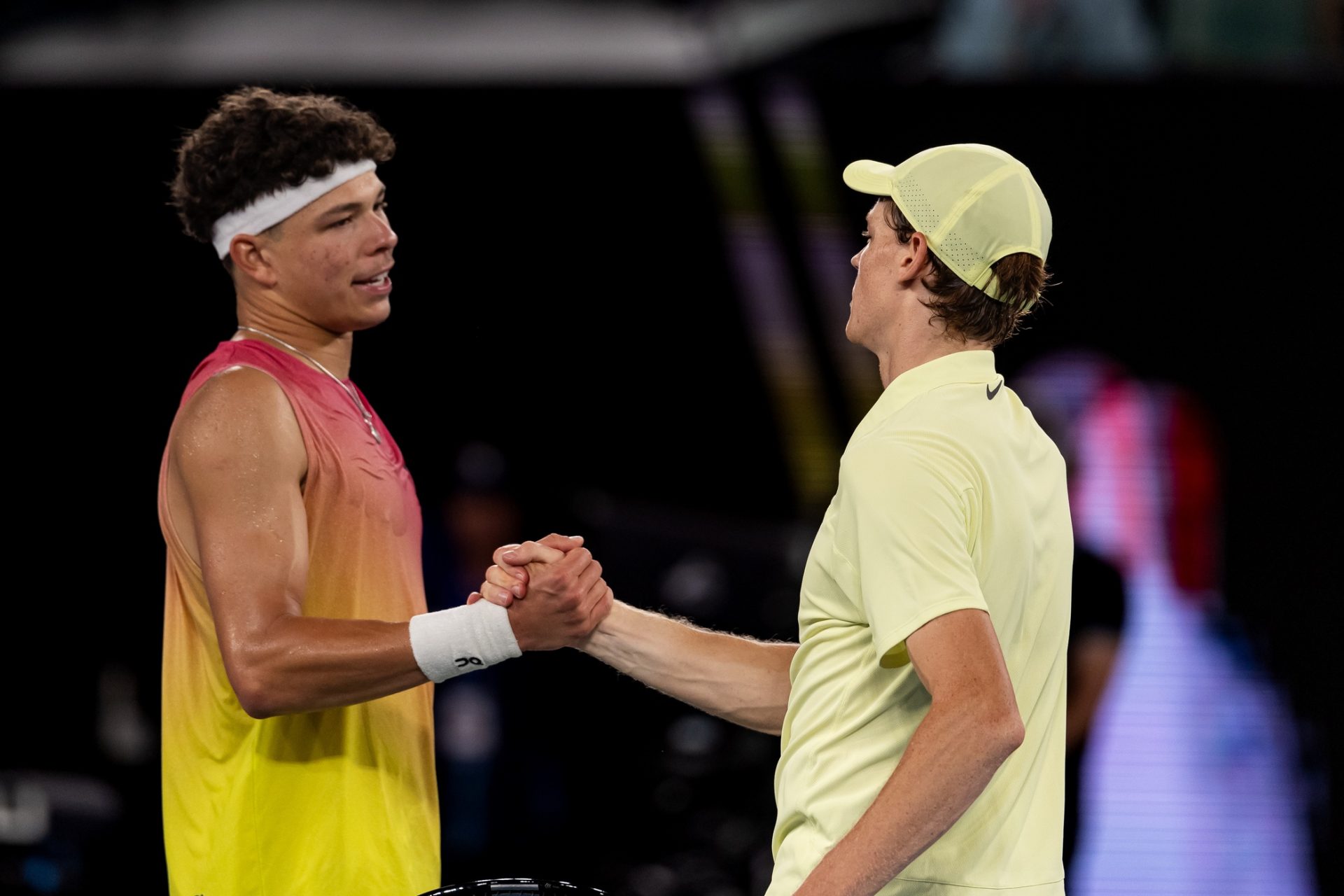Jannik Sinner of Italy and Ben Shelton of United States of America shake hands after their match in the semifinals of the men's singles at the 2025 Australian Open at Melbourne Park.