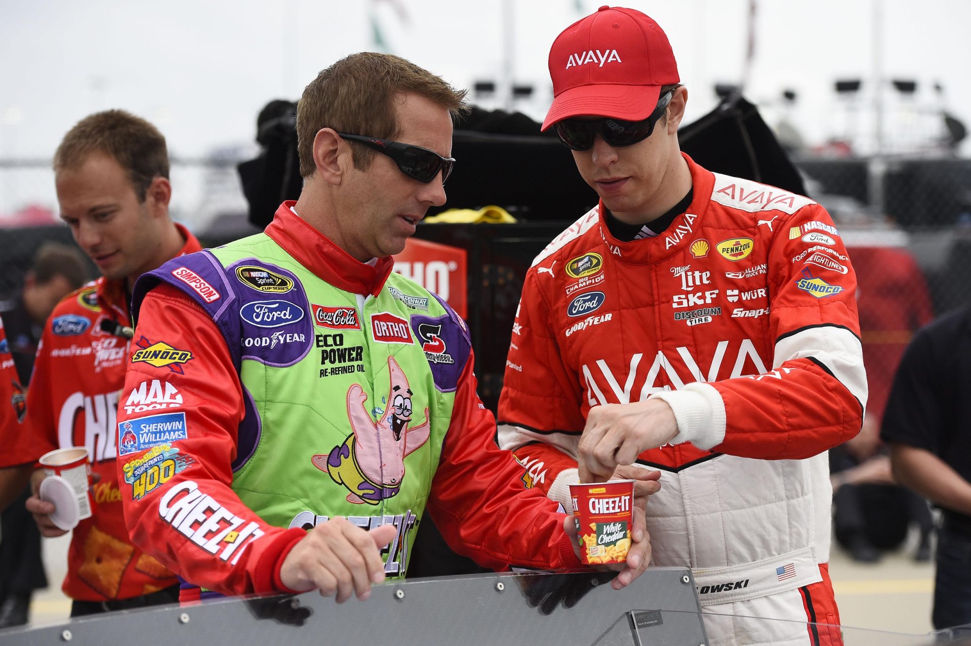NASCAR Sprint Cup Series driver Greg Biffle (left) and NASCAR Sprint Cup Series driver Brad Keselowski (right) talk during qualifying for the Spongebob Squarepants 400 at Kansas Speedway.