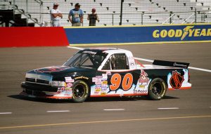 NASCAR Craftsman Truck Series driver Lance Norick (90) in the NHL Arizona Coyotes sponsored Dodge Ram (now Kaulig Racing) during the GM Goodwrench/Delco 300 at Phoenix International Raceway.