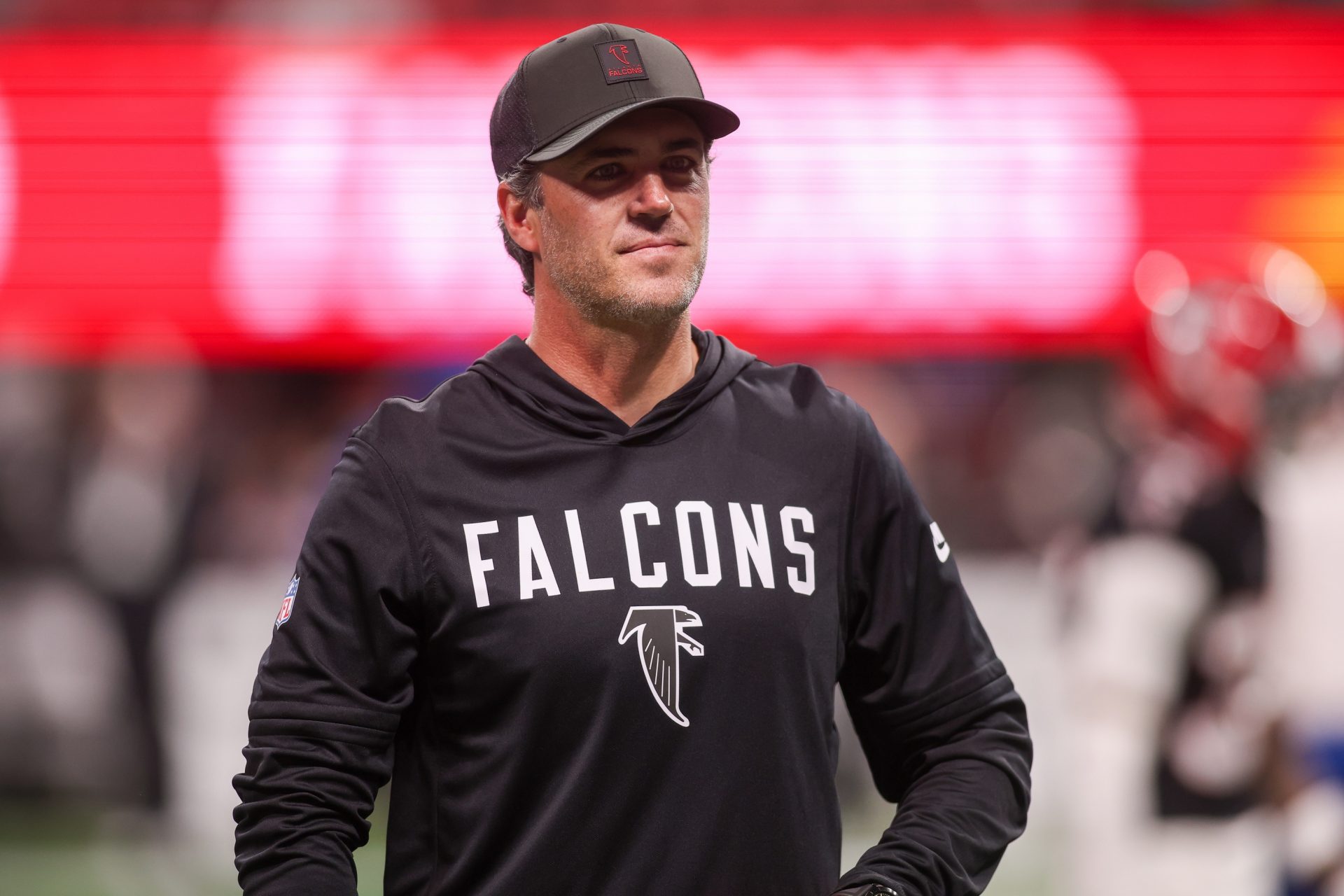 Atlanta Falcons offensive coordinator Zac Robinson on the field before a game against the Los Angeles Rams at Mercedes-Benz Stadium.