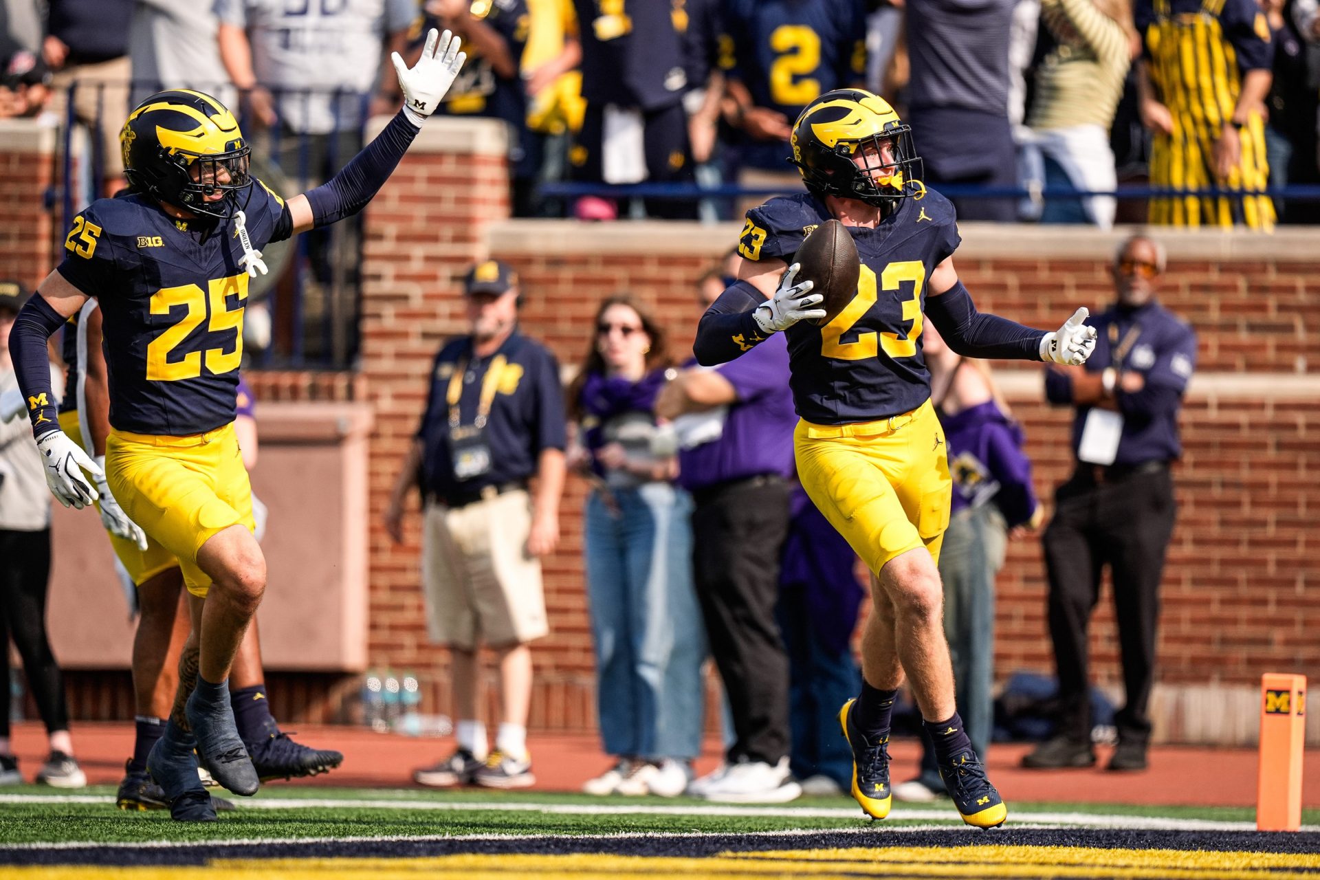 Michigan linebacker Cole Sullivan (23) celebrates an interception against Washington during the second half at Michigan Stadium in Ann Arbor on Saturday, Oct. 18, 2025.