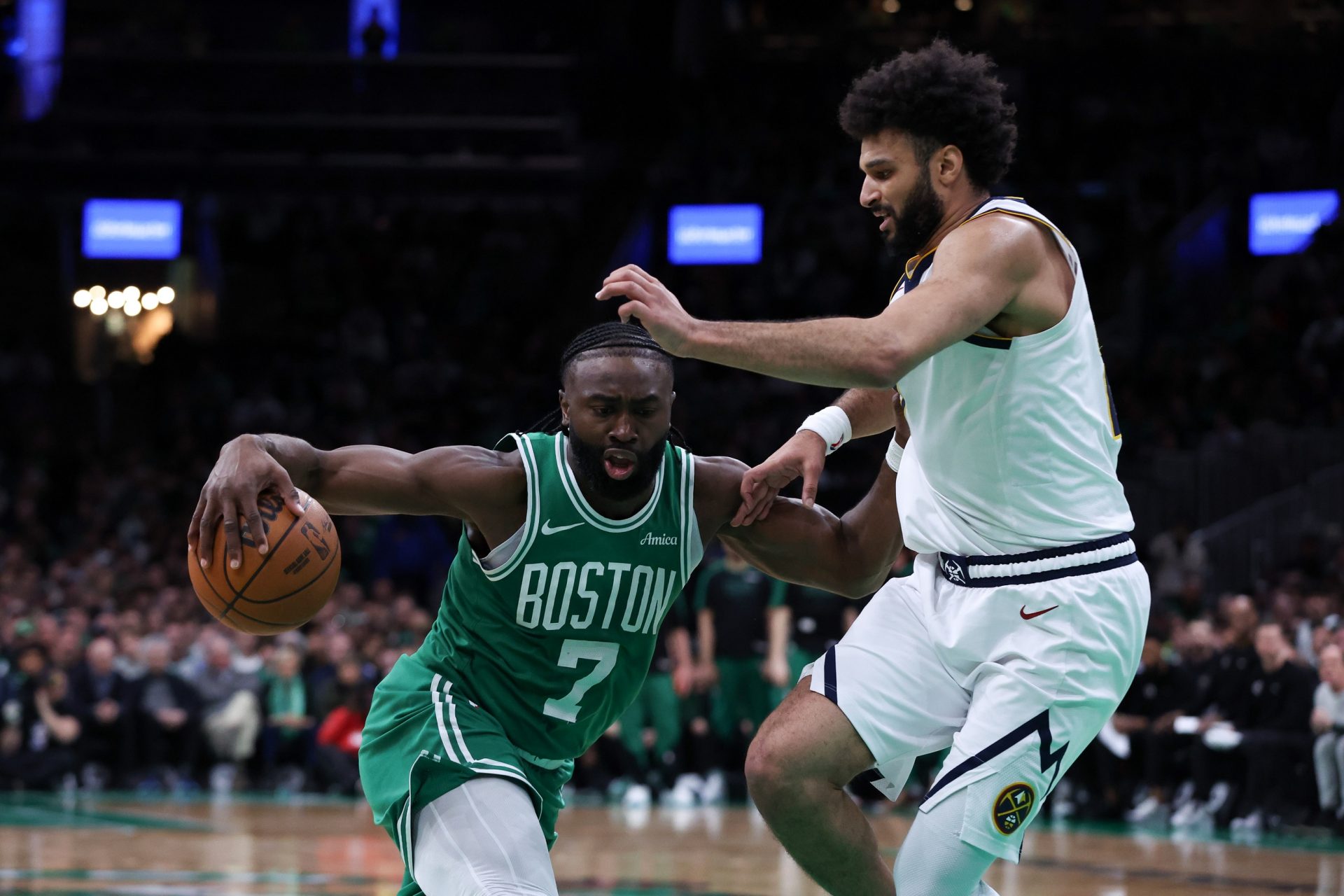 Boston Celtics forward Jaylen Brown (7) drives to the basket during the second half against the Denver Nuggets at TD Garden.