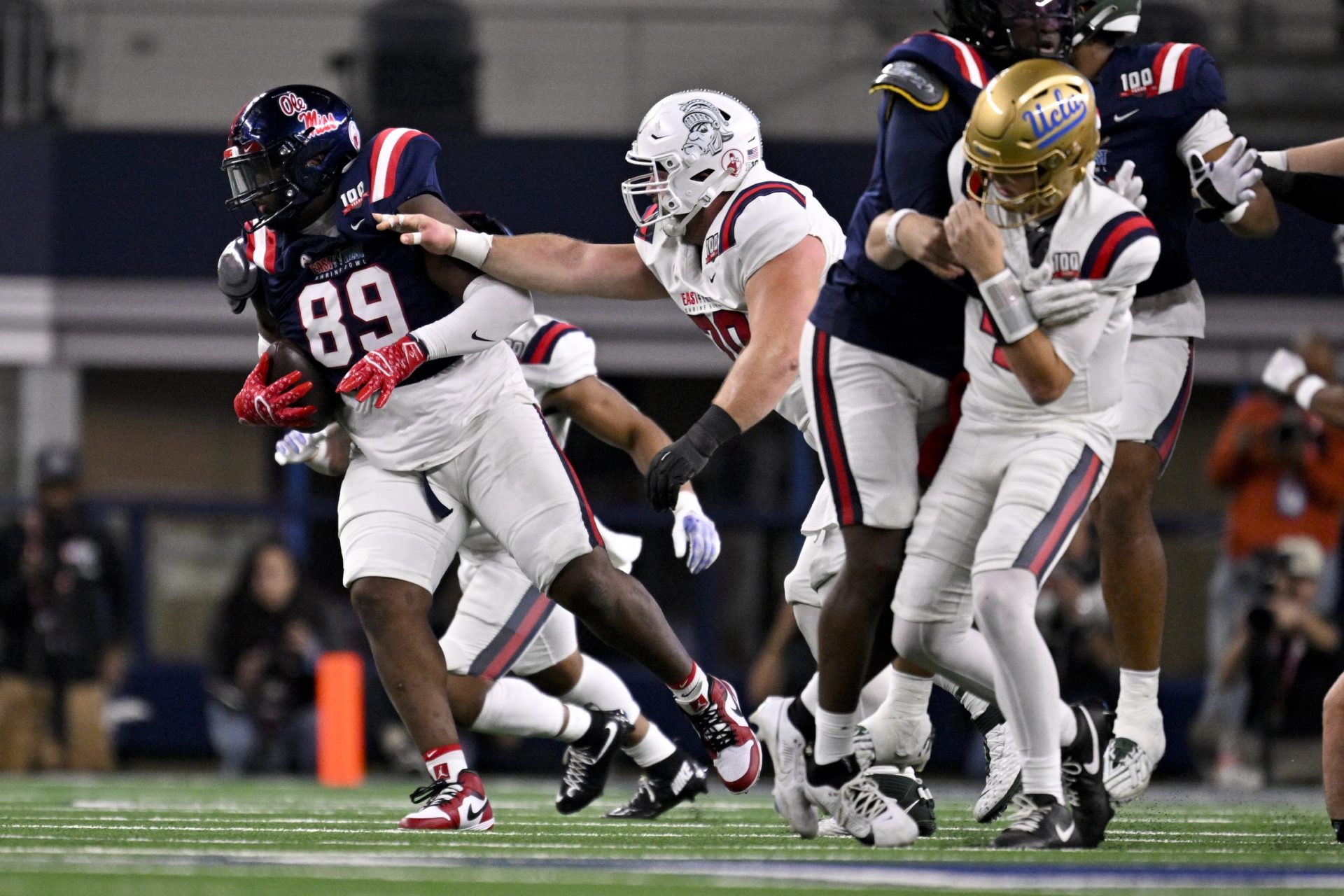East defensive lineman JJ Pegues of Ole Miss (89) intercepts a pass by West quarterback Ethan Garbers of UCLA (4) during the second half at AT&T Stadium.