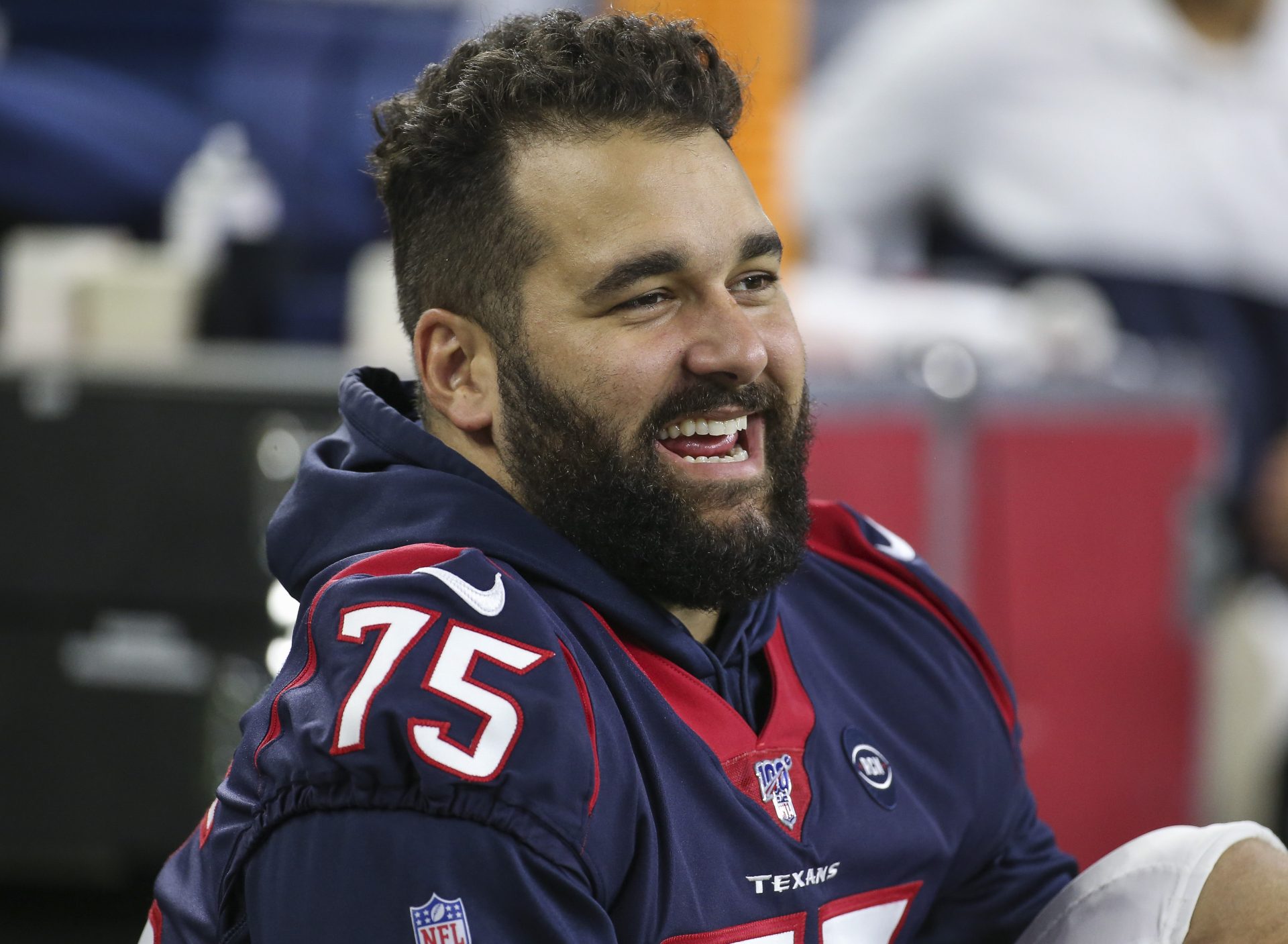 Houston Texans offensive tackle Matt Kalil (75) watches from the bench during the second quarter against the Los Angeles Rams at NRG Stadium.