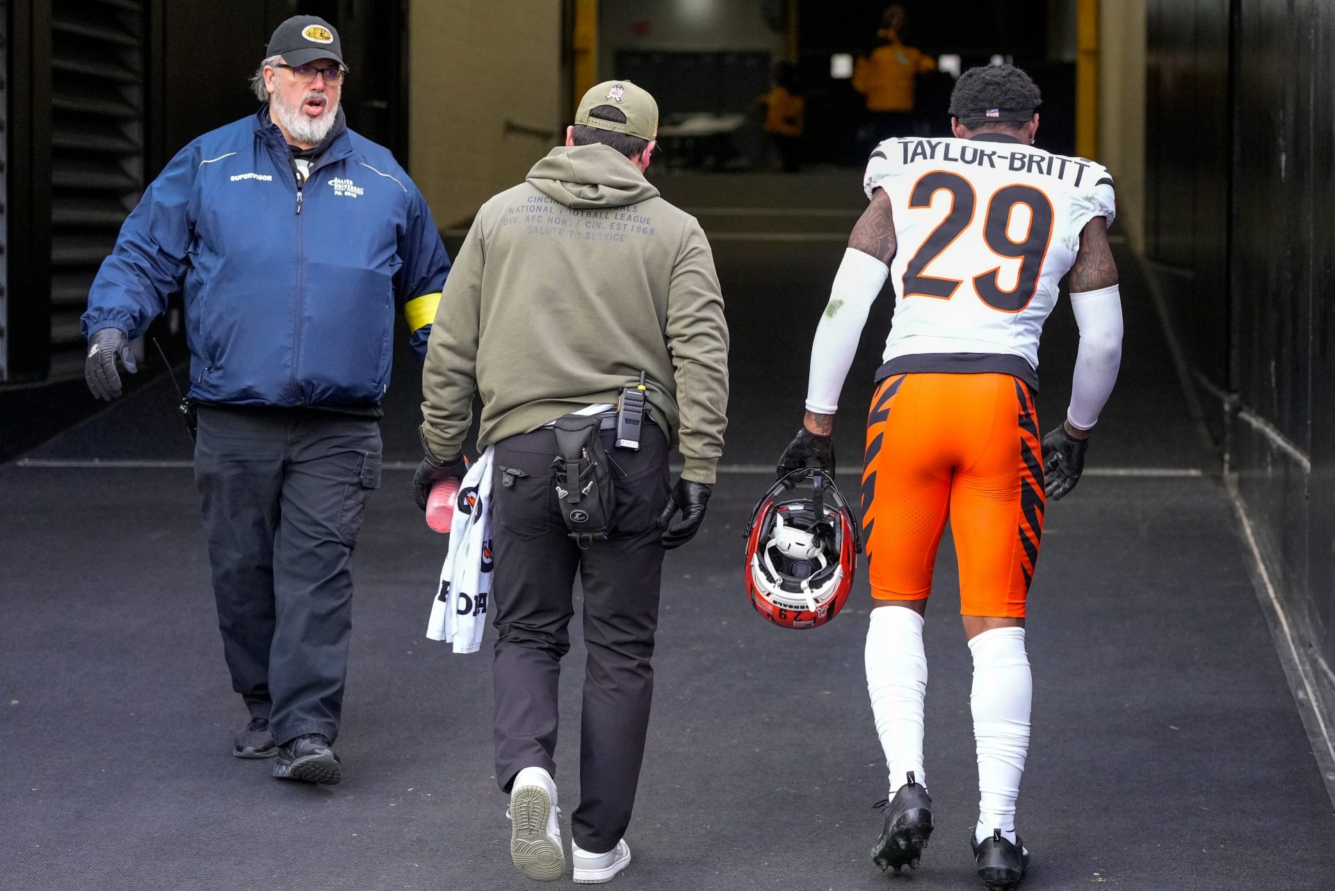 Cincinnati Bengals cornerback Cam Taylor-Britt (29) walks for the locker room with an injury in the second quarter of the NFL Week 11 game between the Pittsburgh Steelers and the Cincinnati Bengals at Acrisure Stadium in Pittsburgh on Sunday, Nov. 16, 2025. The Steelers led 10-6 at halftime.