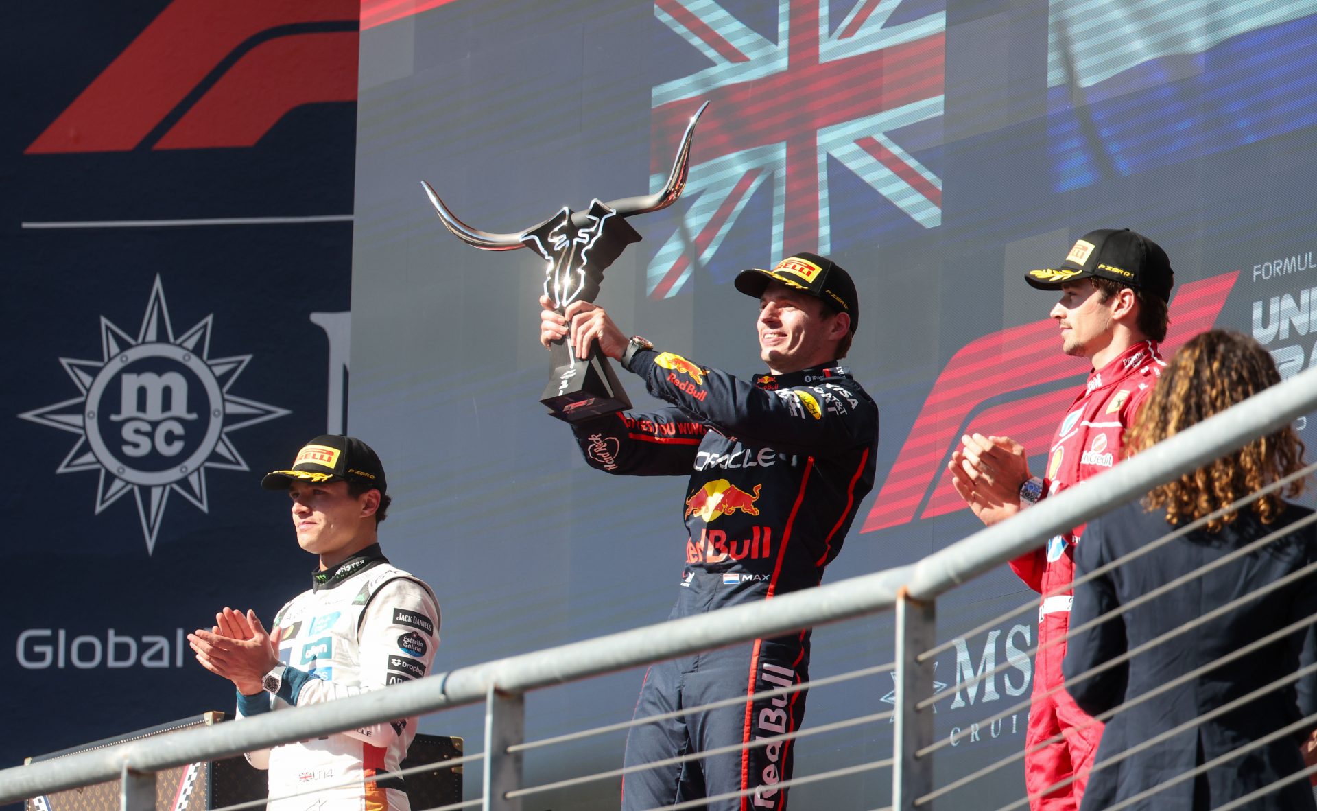 (L-R) McLaren's Lando Norris, Red Bull Racing's Max Verstappen and Charles Leclerc of Scuderia Ferrari on the US GP podium. Source: Imagn Images