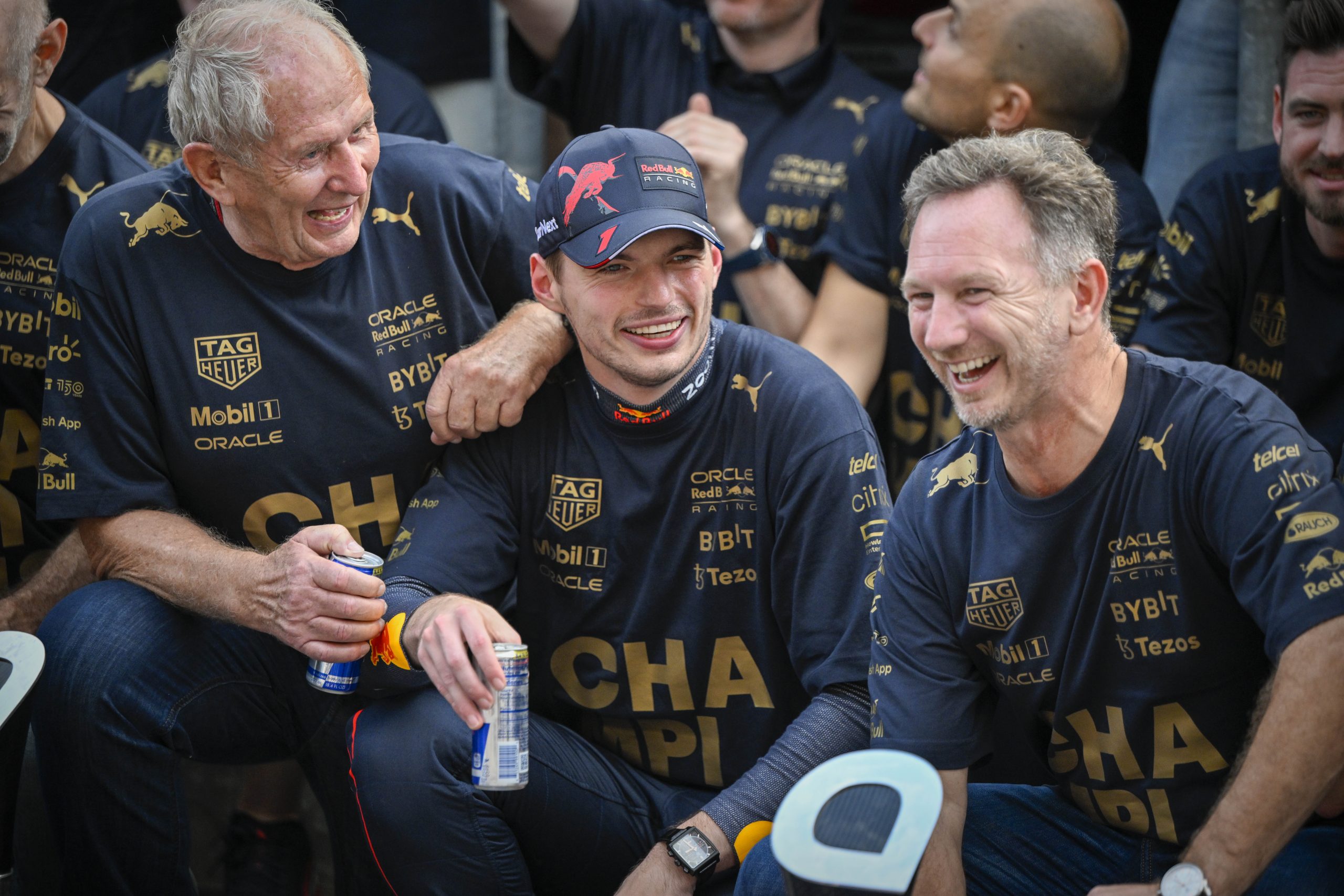 Oct 23, 2022; Austin, Texas, USA; (from left) Red Bull team advisor Helmut Marko and Red Bull Racing Limited driver Max Verstappen of Team Netherlands and Team Principal Christian Horner celebrate winning the U.S. Grand Prix F1 race at Circuit of the Americas. Mandatory Credit: Jerome Miron-USA TODAY Sports