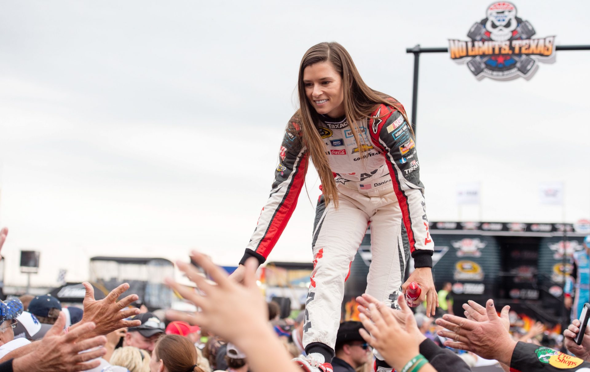 Sprint Cup Series driver Danica Patrick (10) is introduced before the start of the AAA Texas 500 at Texas Motor Speedway.