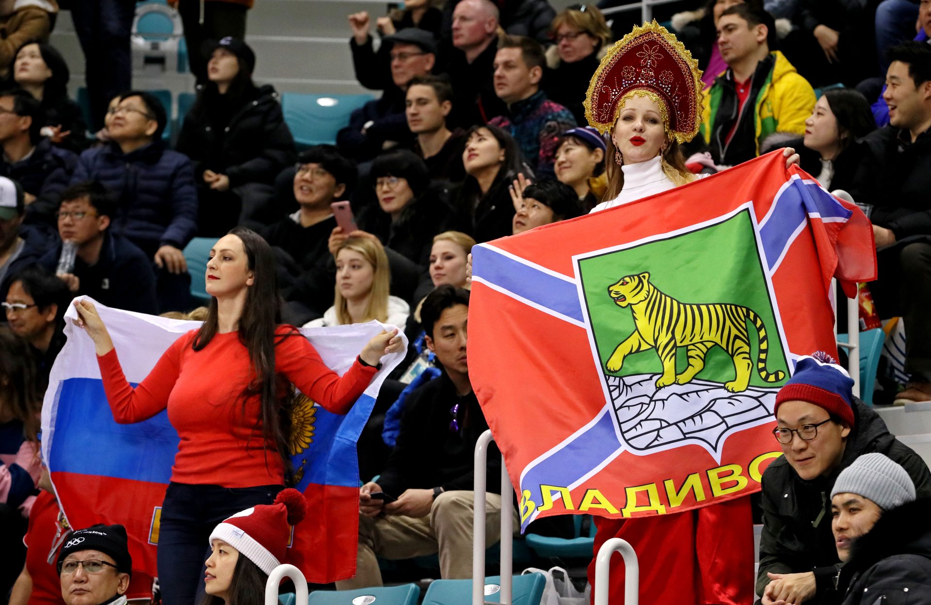 Russian fans cheer for the Olympic Athletes from Russia against Germany in the men's ice hockey gold medal match during the Pyeongchang 2018 Olympic Winter Games at Gangneung Hockey Centre.