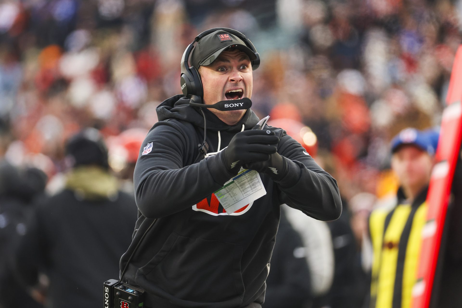 Cincinnati Bengals head coach Zac Taylor signals for a timeout during the fourth quarter against the Cleveland Browns at Paycor Stadium.